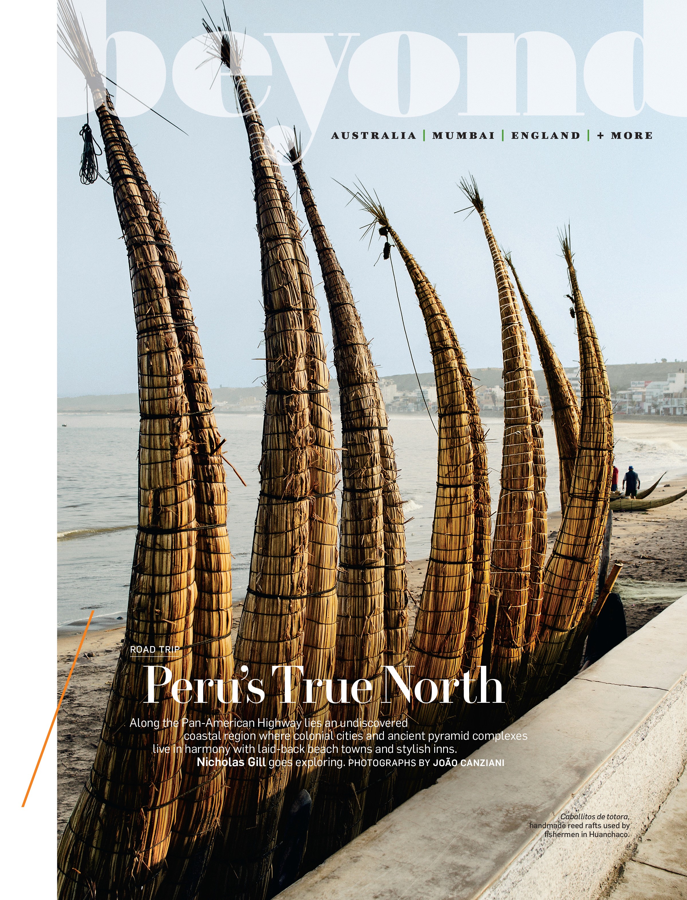 A layout of Peru's laid-back beach with a stack of handmade reed rafts used by local fishermen.