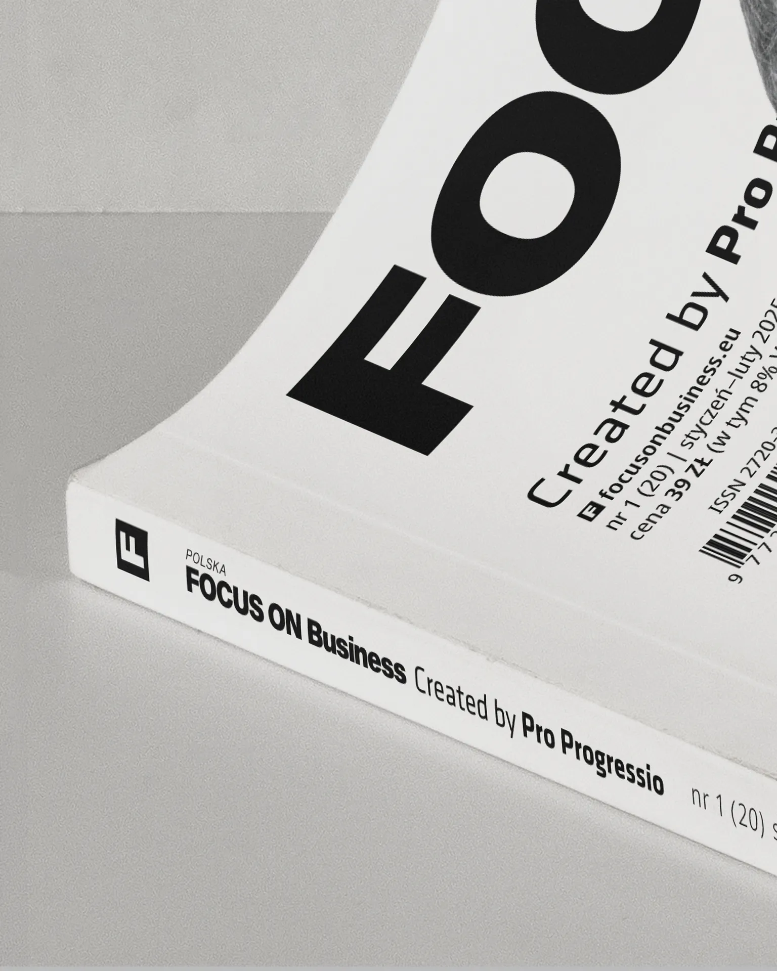 Magazine cover with logo and editorial; magazine spine with logo