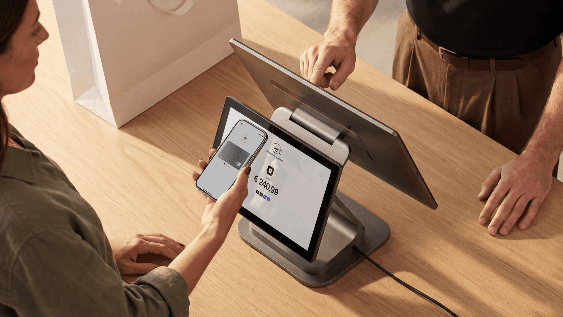 Image showing woman paying with her phone