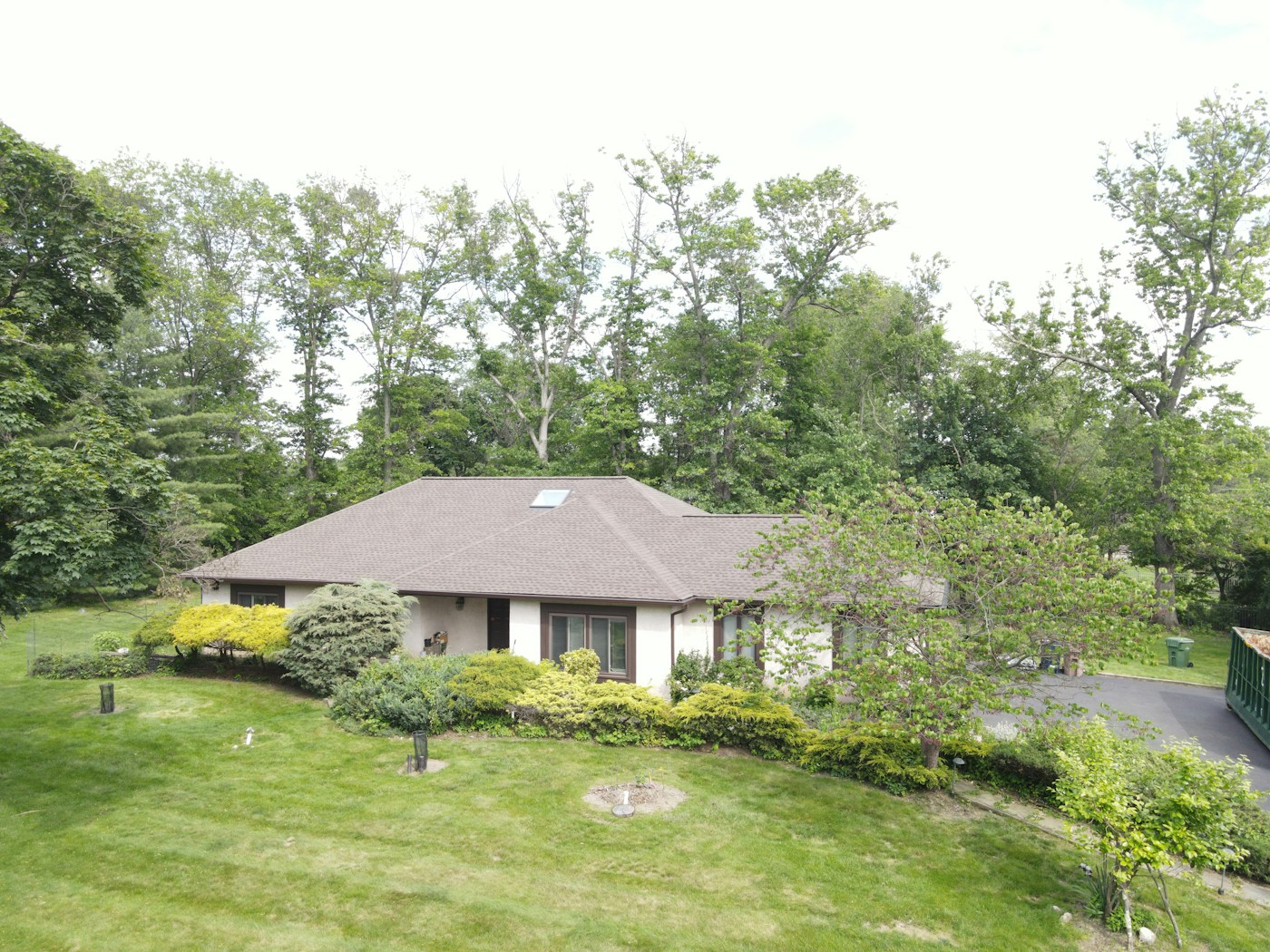 Residential home with a new asphalt shingle roof