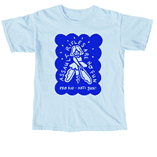Light blue t-shirt with a graphic design. The design features a girl holding two objects, with text that says "Assault Rifles Are No Fun" and "Pro Kid - Anti Gun".