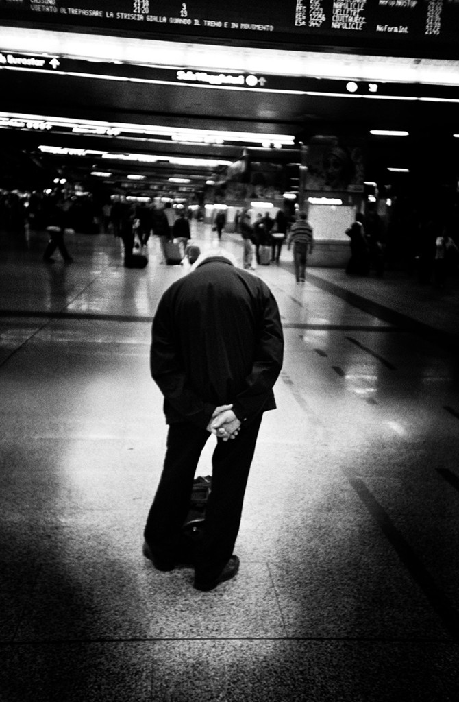 Palina – Soft Laziness – curled up asleep on a bed in a spacious minimal room