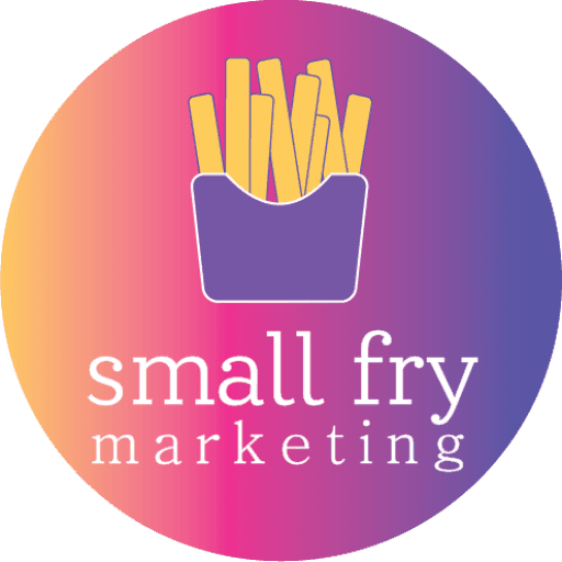 Modern building with balconies full of pink flowers.