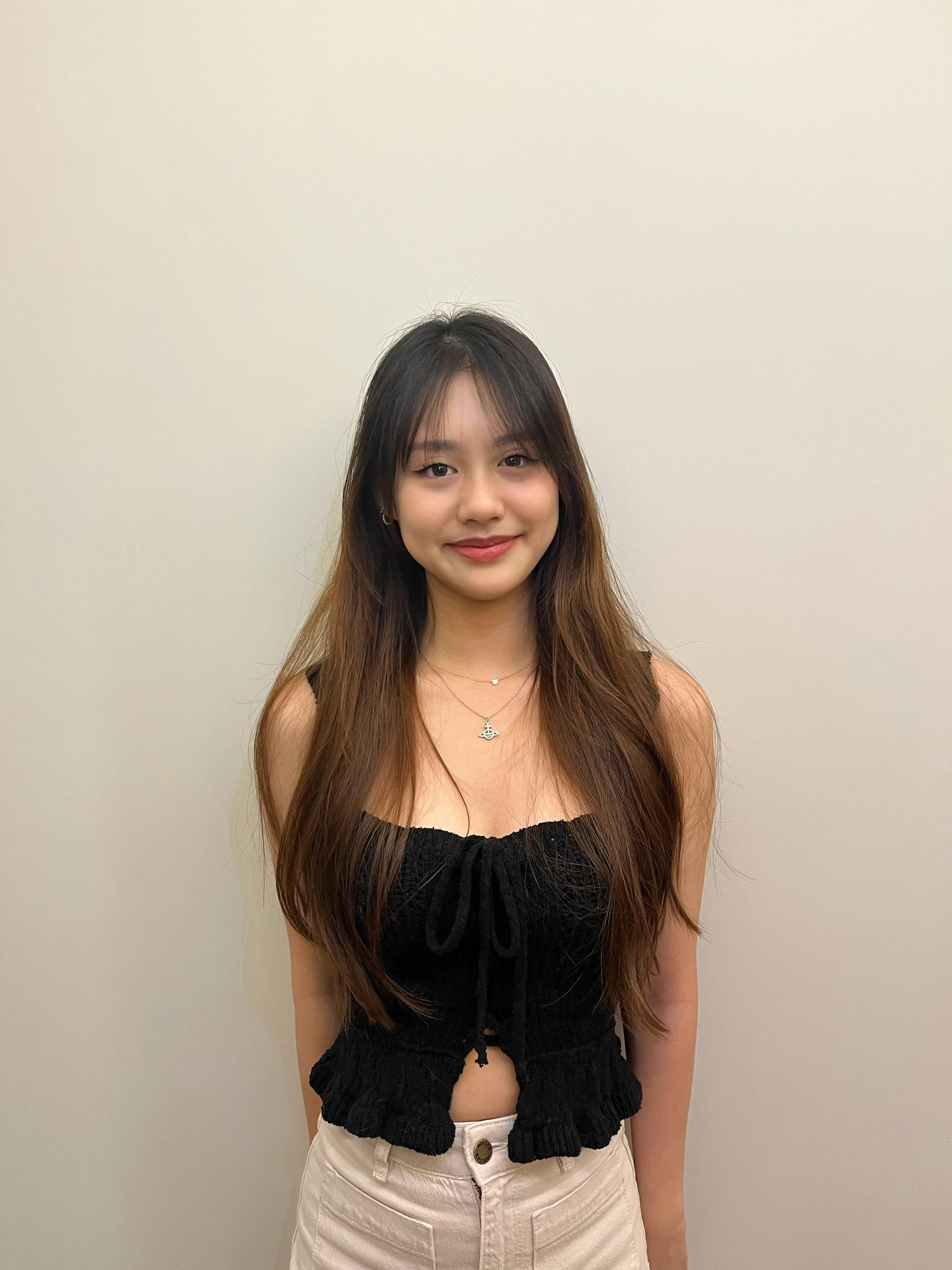 A young girl smiling