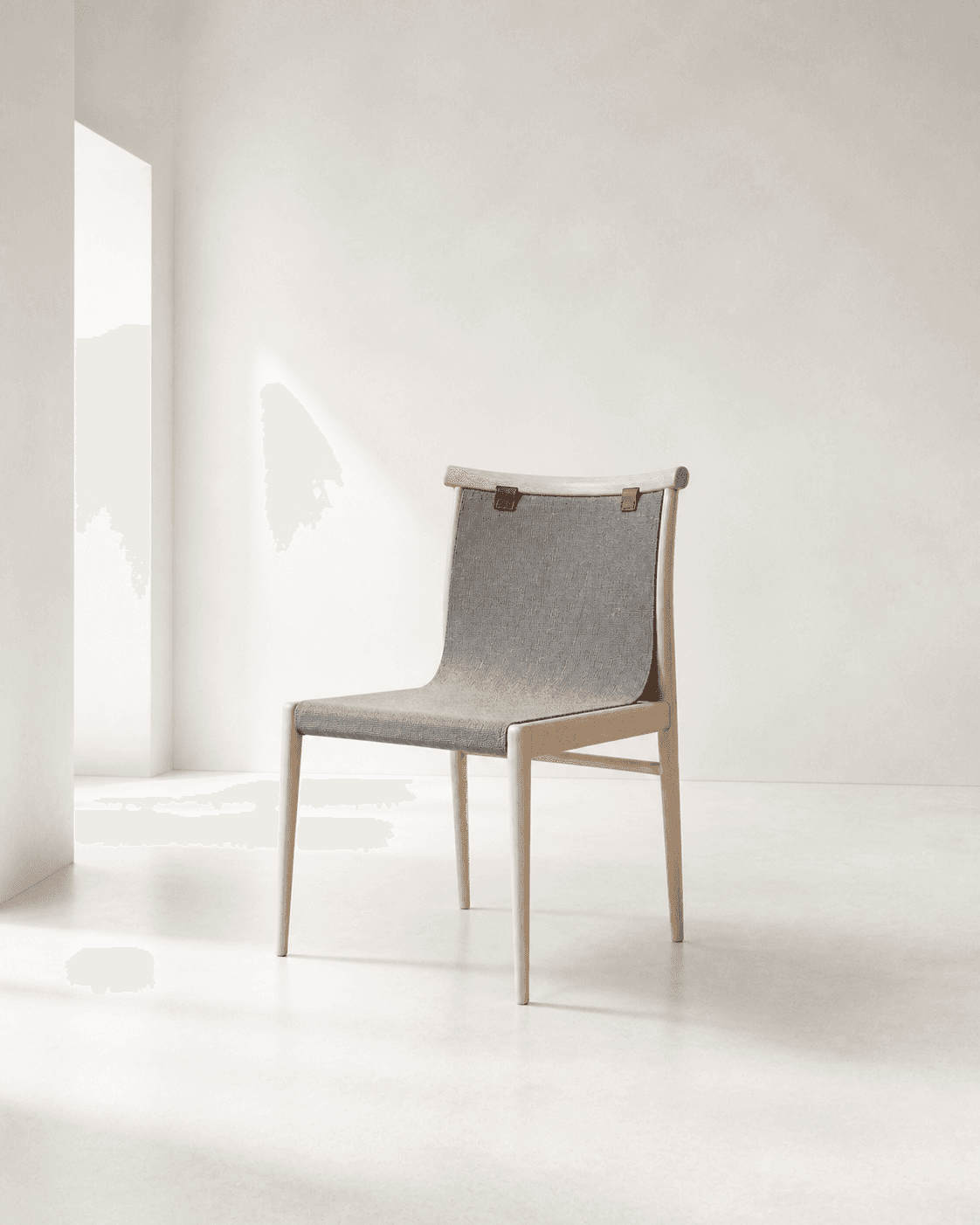 Pale-ash dining chair with a mineral-grey woven sling in a luminous white room
