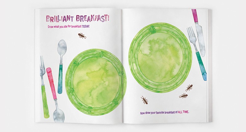 An opened book showing pictures of green jelly, table knifes, spoons and forks with text: Brilliant Breakfast!