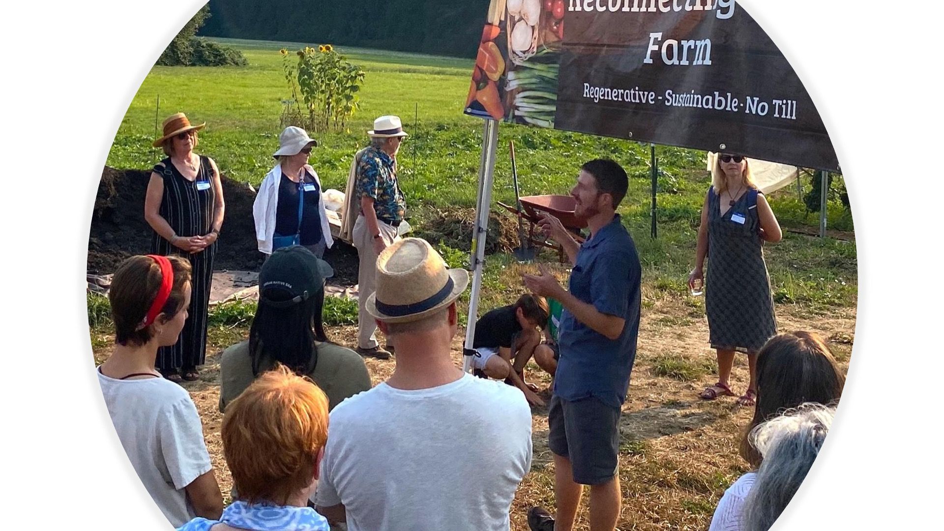 Brett of Reconnecting Roots Farm speaking with community members during a farm gathering at Rooted NorthwestBrett of Reconnecting Roots Farm speaking with community members during a farm gathering at Rooted Northwest
