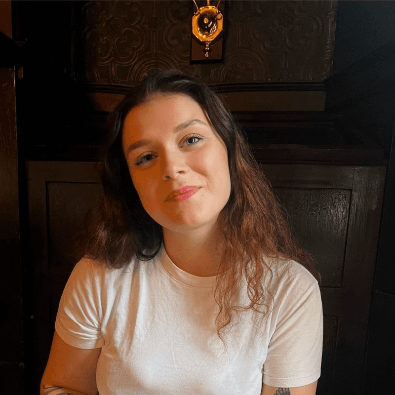 Smiling woman in white t-shirt