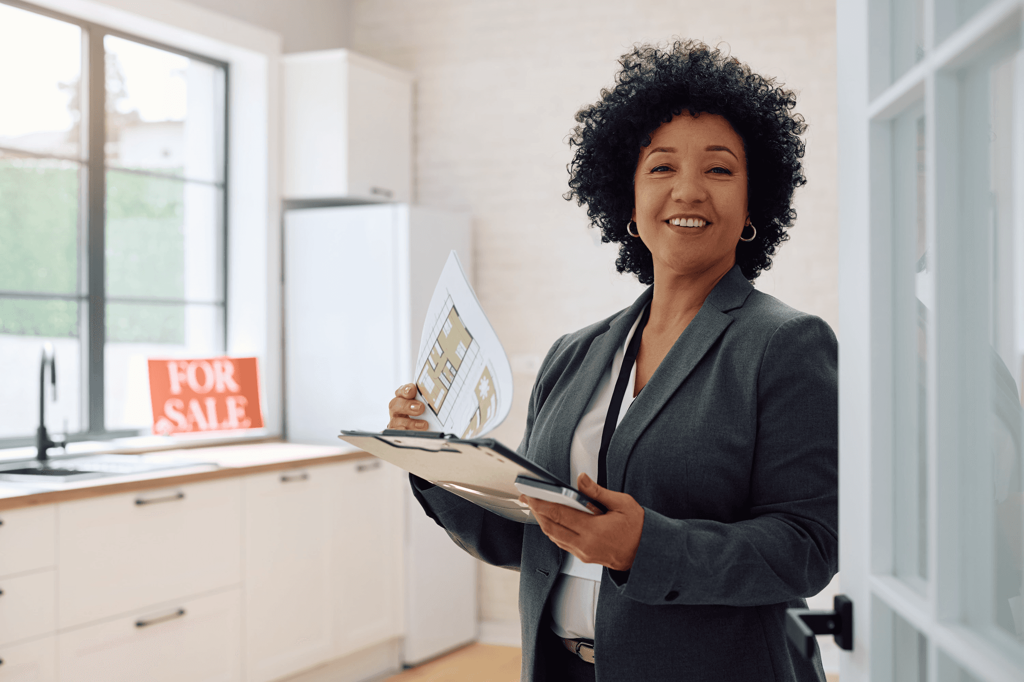 Lady going over paperwork for a house