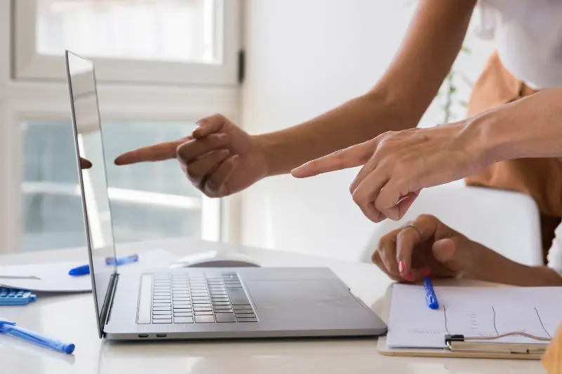 white and pink analog alarm clock