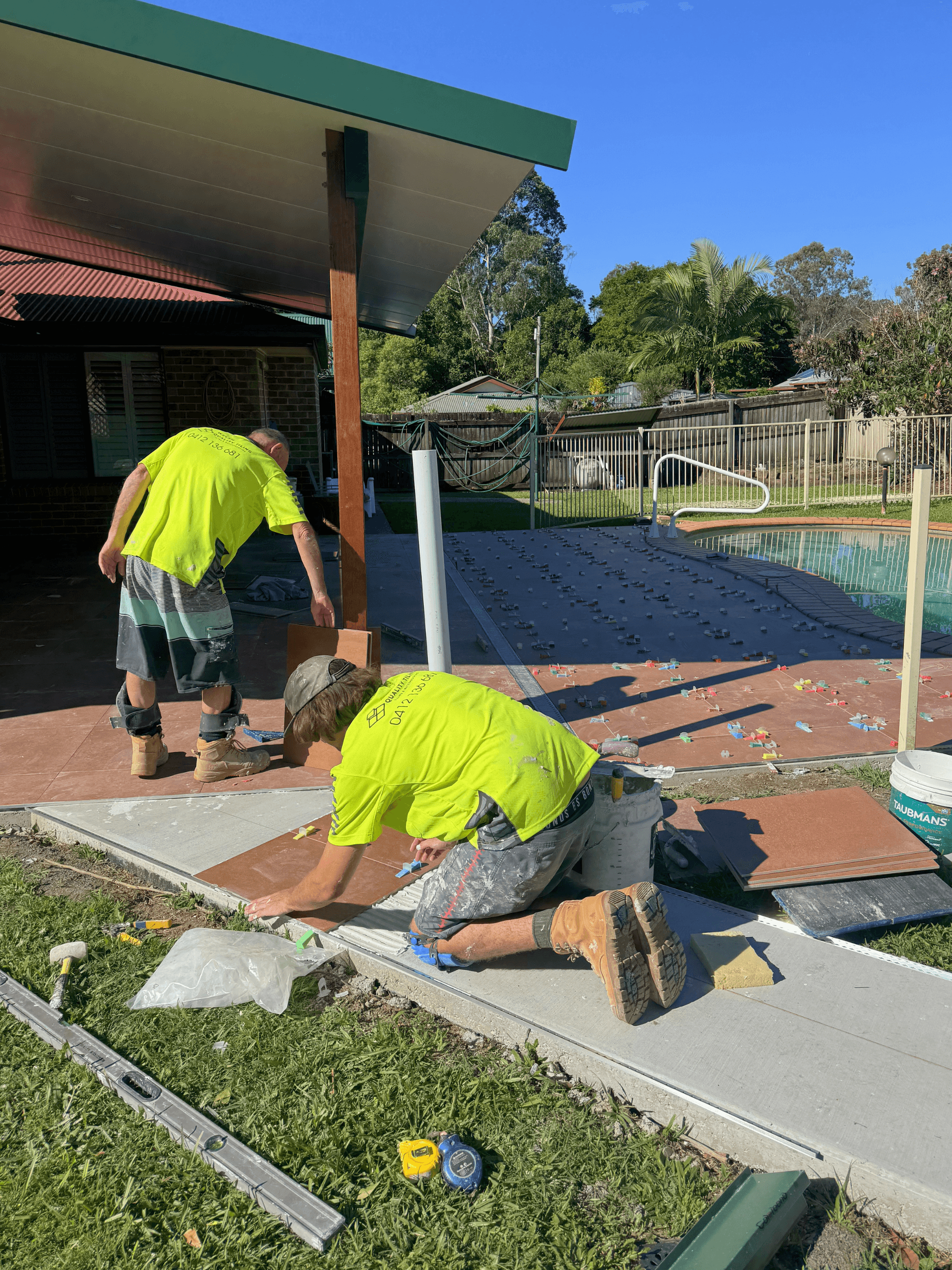 Landscaped exterior pathway and access improvements for a residential property.