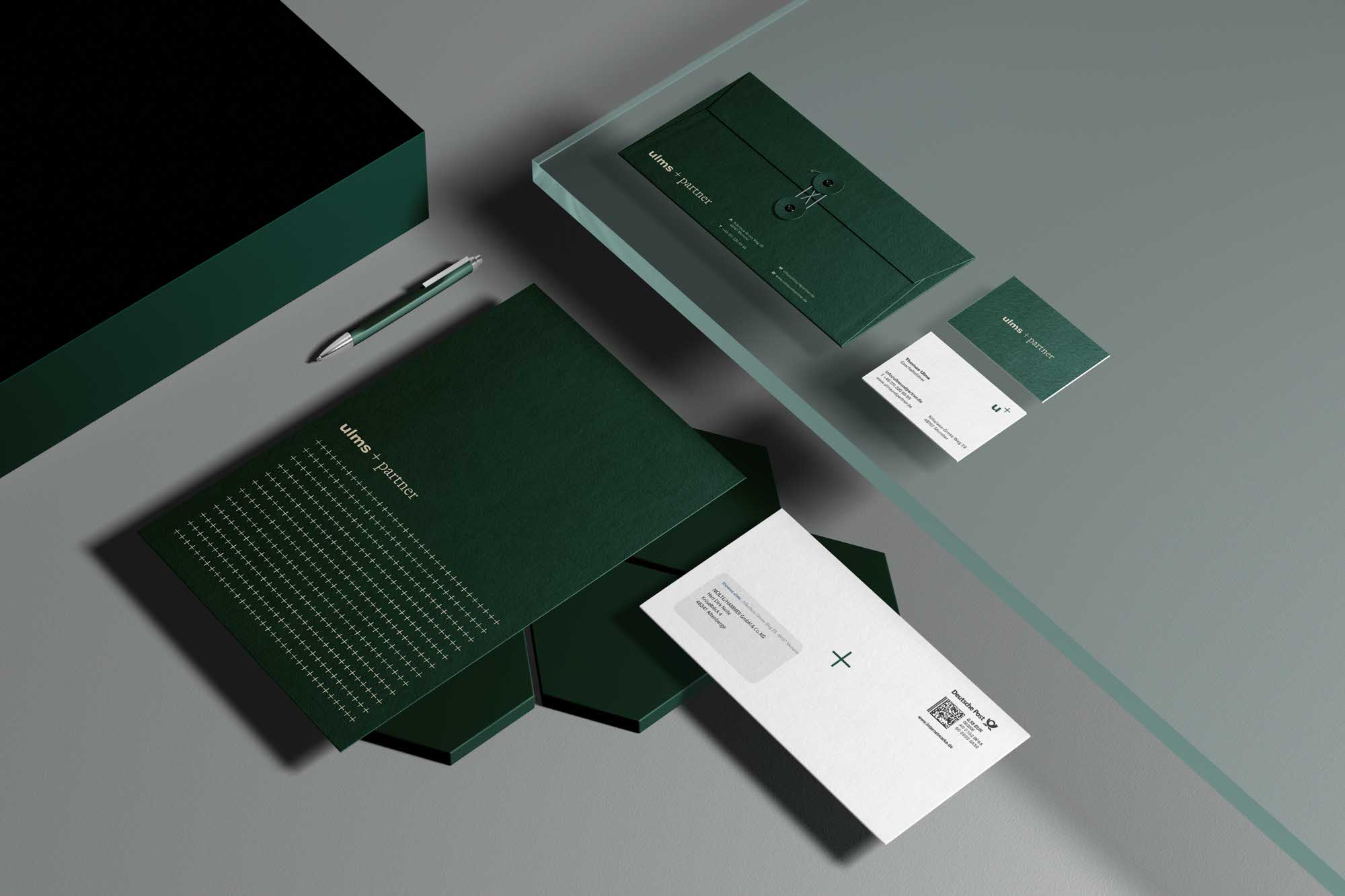 Briefpapier und Visitenkarten für Ulms + Partner – seriöses Design mit Farbwelt in Grün