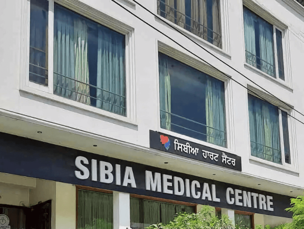 Exterior view of Sibia Medical Centre, a renowned healthcare facility in India specializing inArtery Chelation Therapy for Heart Disease, showcasing its modern building and welcoming environment for patients.