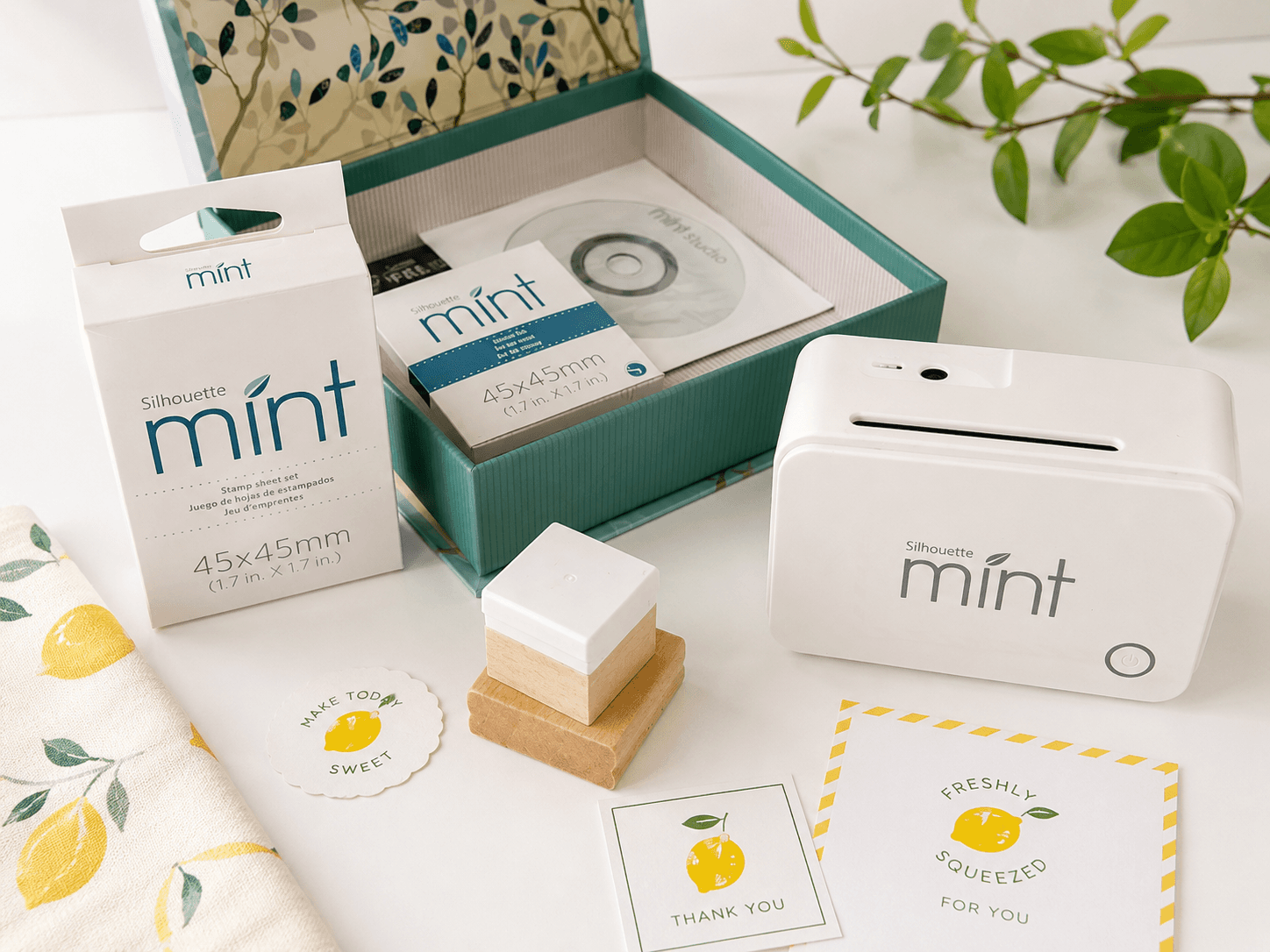 Silhouette Mint stamp maker used for custom logos and packaging.