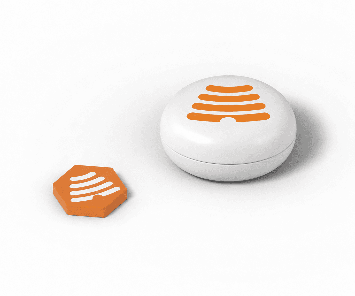 HoneyBeacon Bluetooth device beside the smaller HoneyTag NFC tag