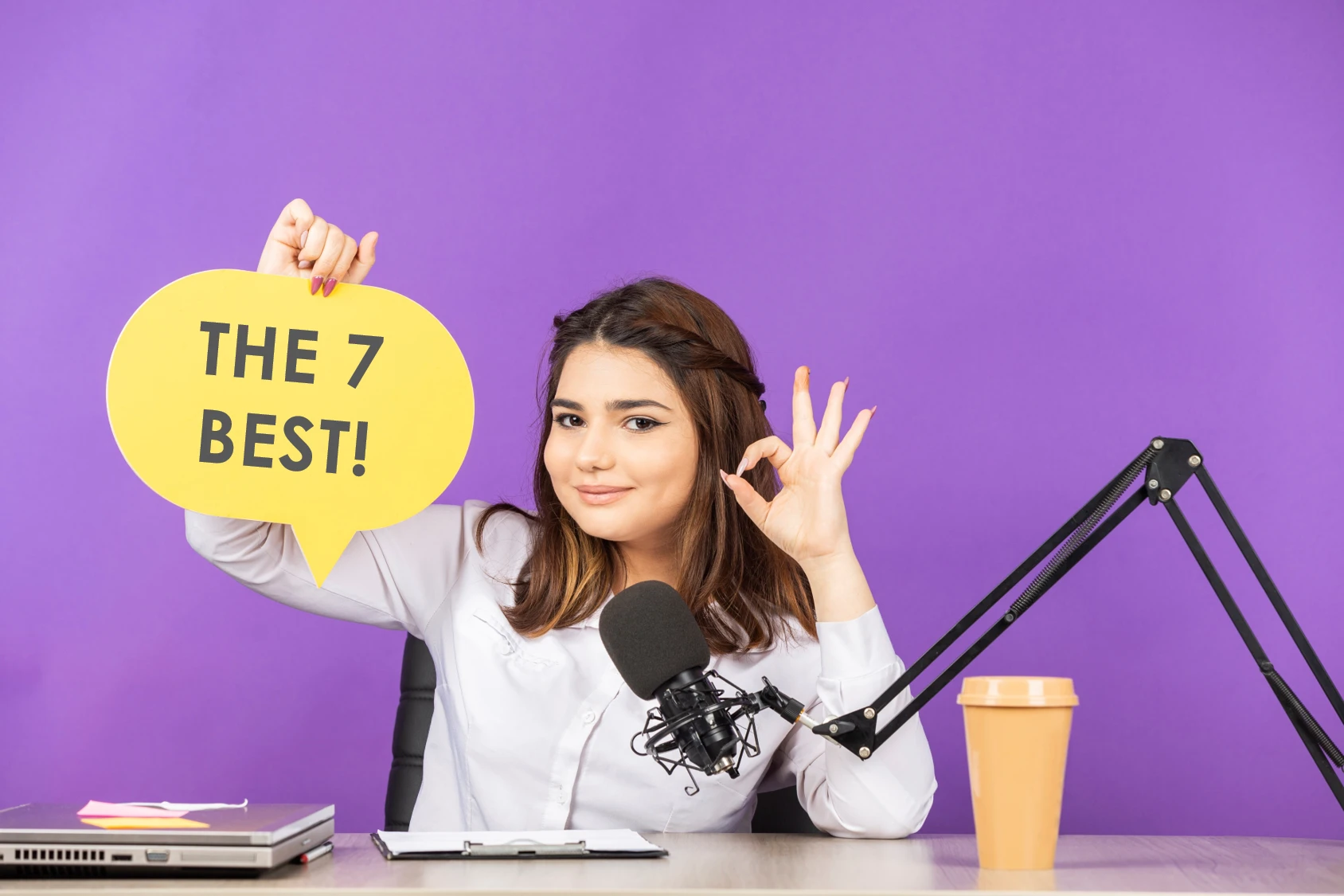 Podcast woman holding a sign