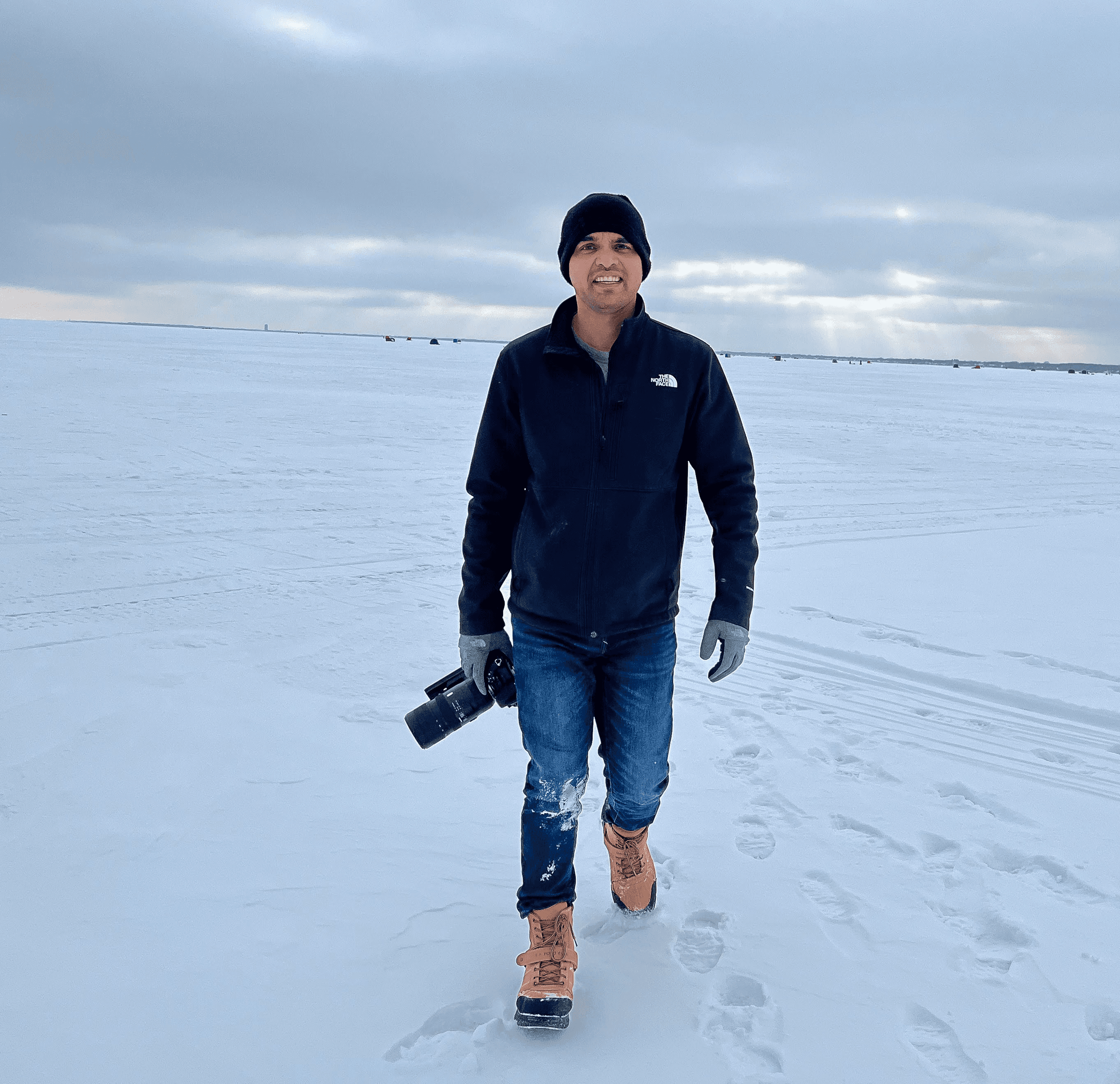 Photographer holding camera