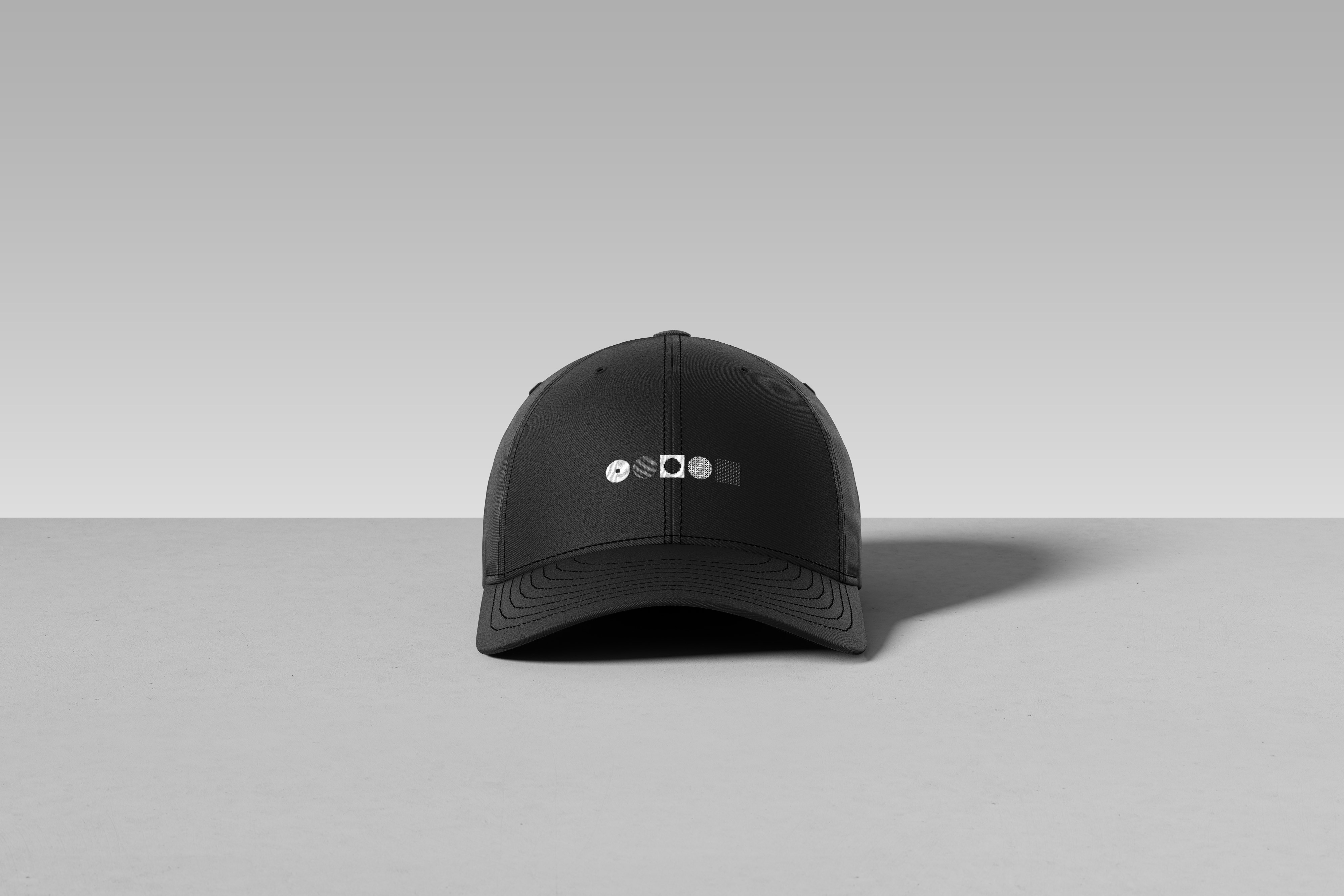 a cap with the Bertino Brand symbols on