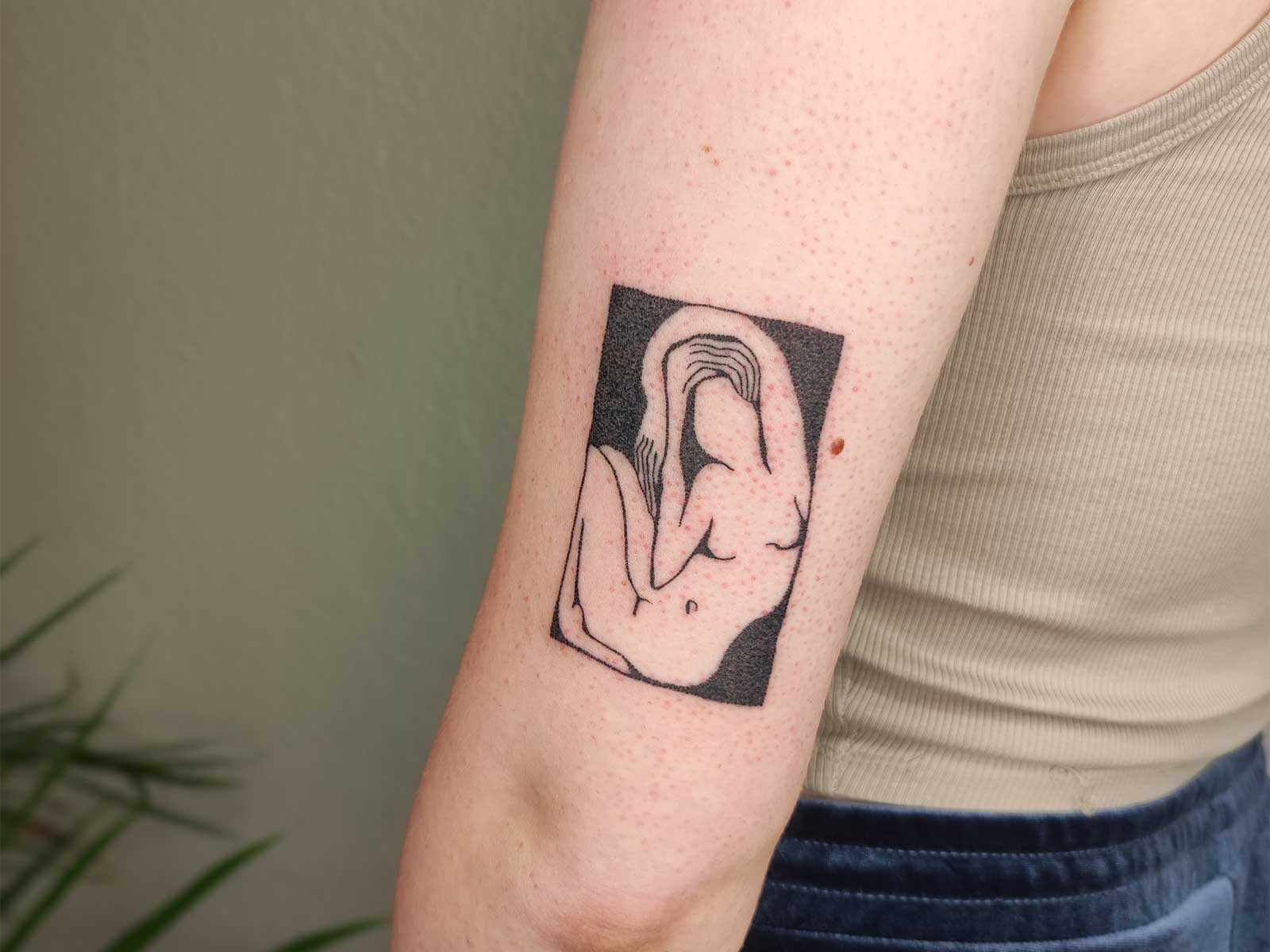 fluid woman body in a square tattoo