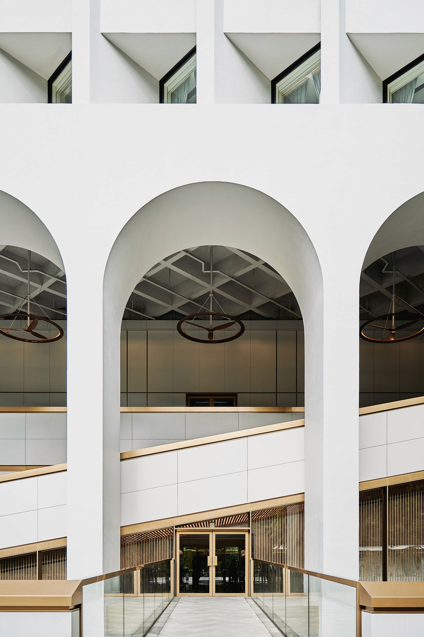 Documentary photography of ceramist holding his finished masterpiece.