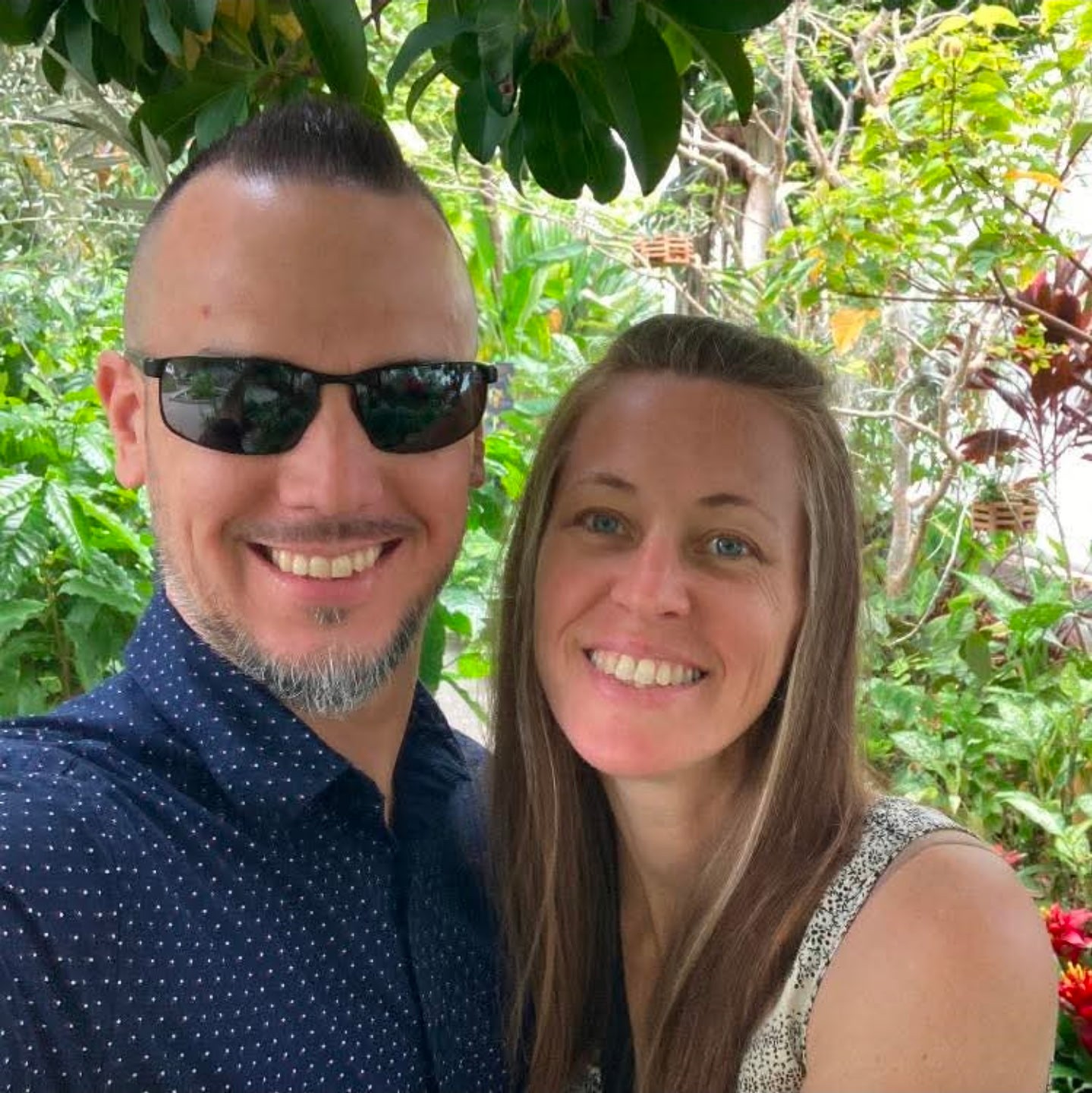 Sara is a client smiling to the camera happily