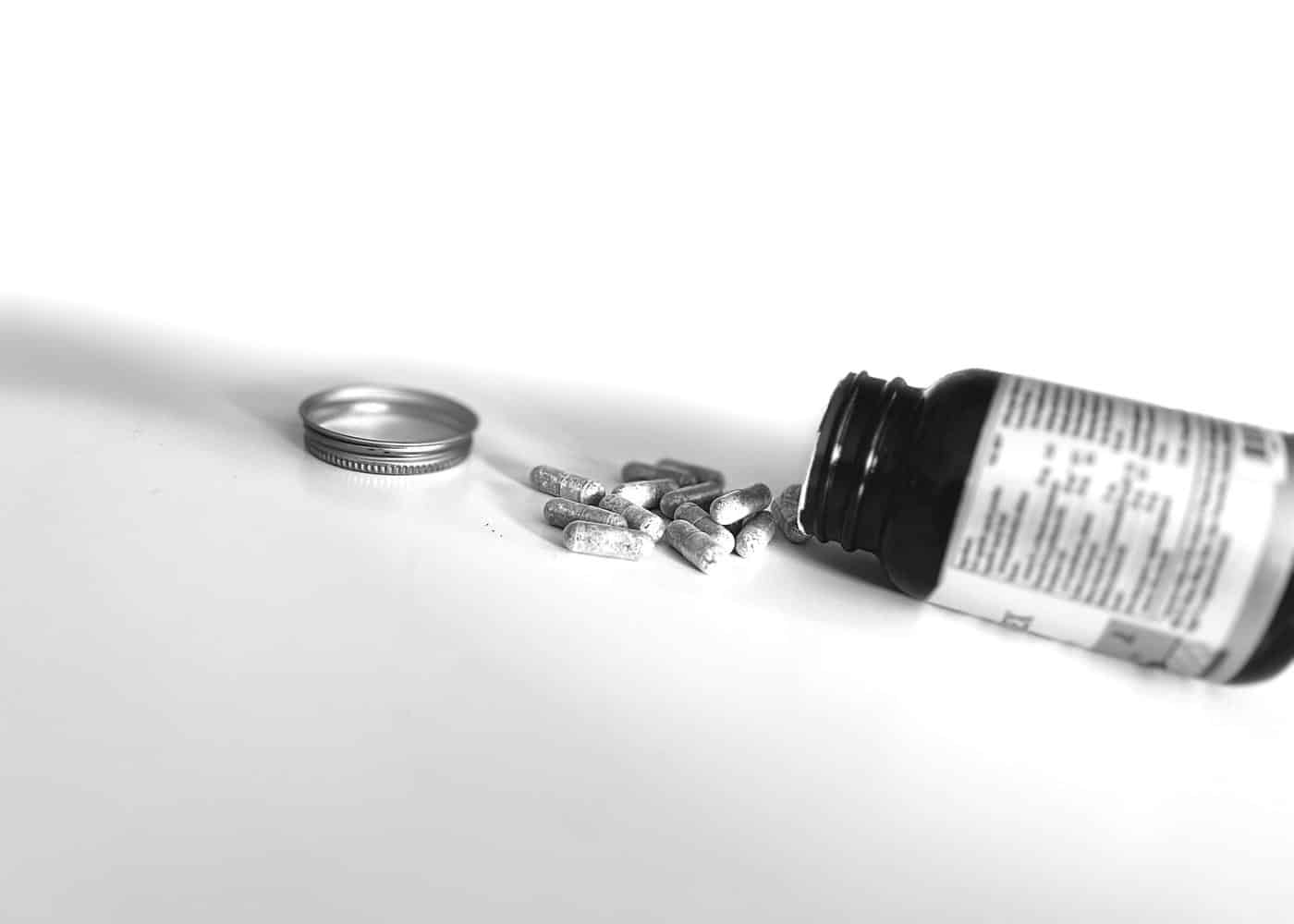 Closeup of a nootropics supplement bottle in B&W