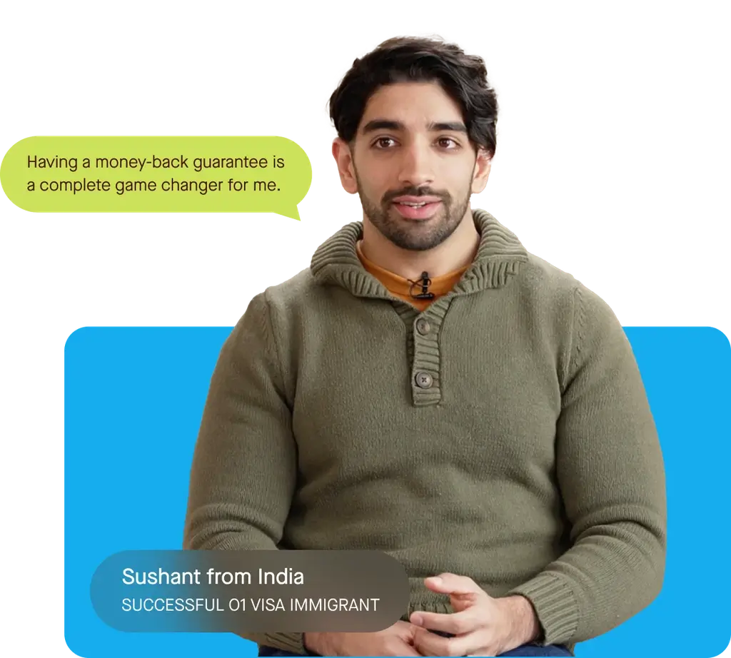 Successful O1 visa immigrant in a green sweater explaining that the money back guarantee was a game changer for him.