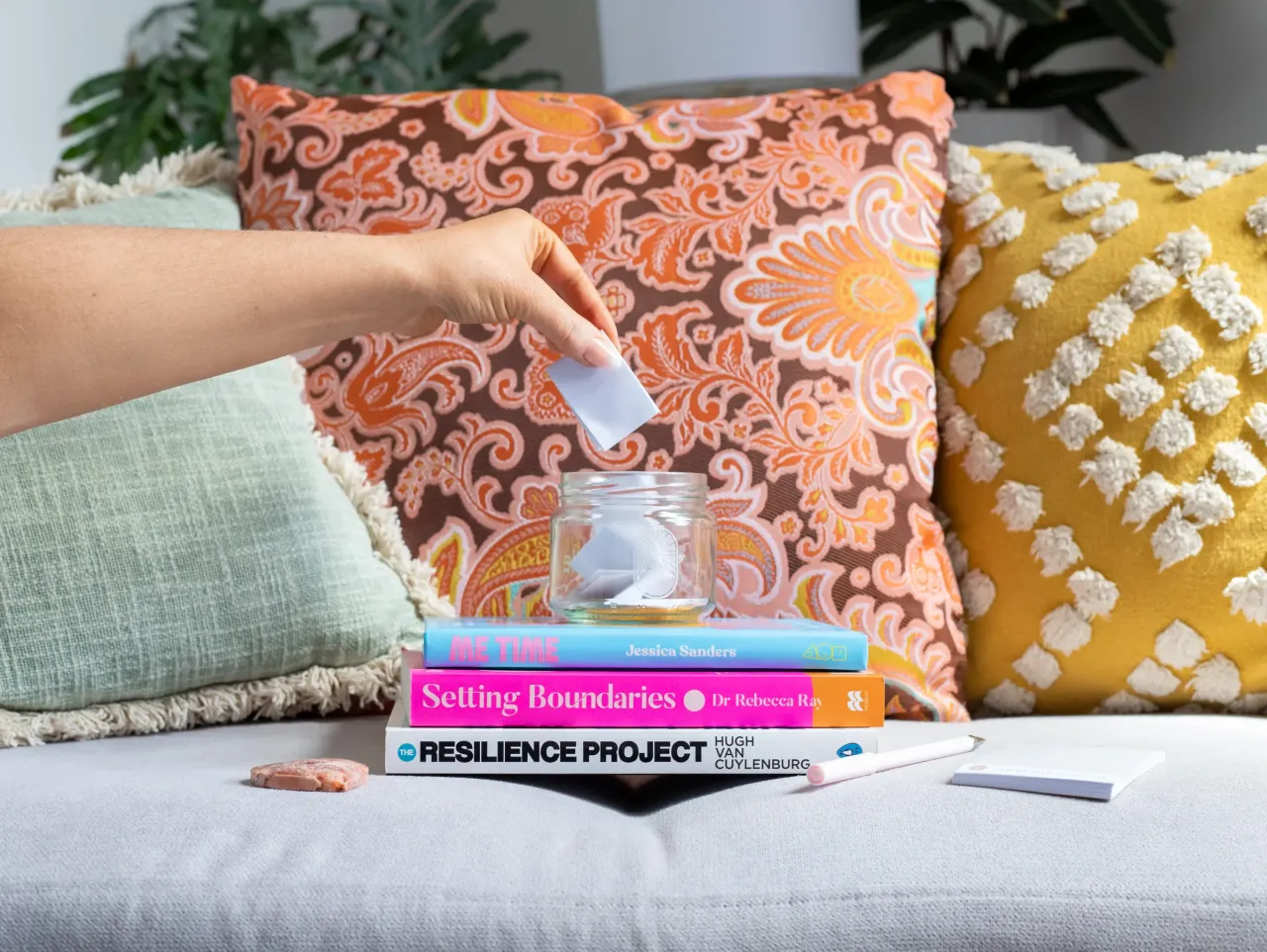 Pregnant woman's belly illuminated by sunlight.