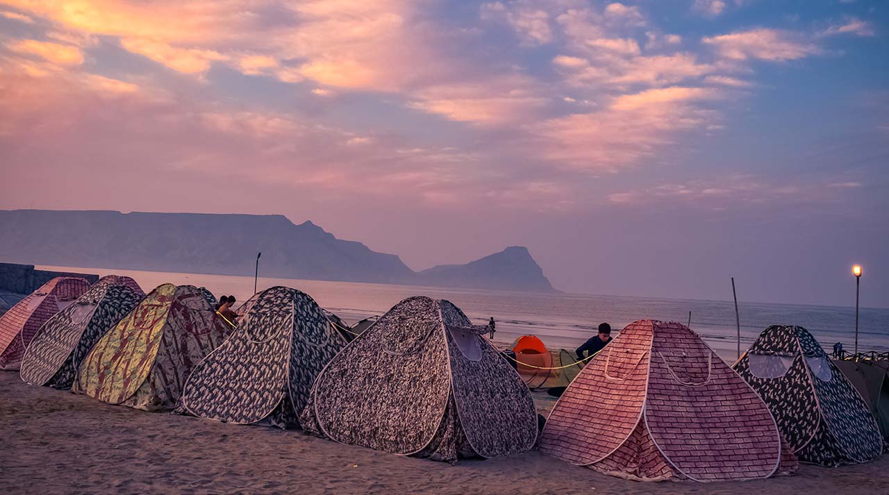 lake in the middle of mountains during daytime