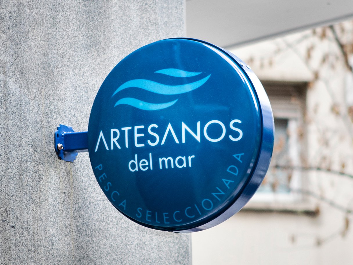 Rustic cabin in a golden field at sunset