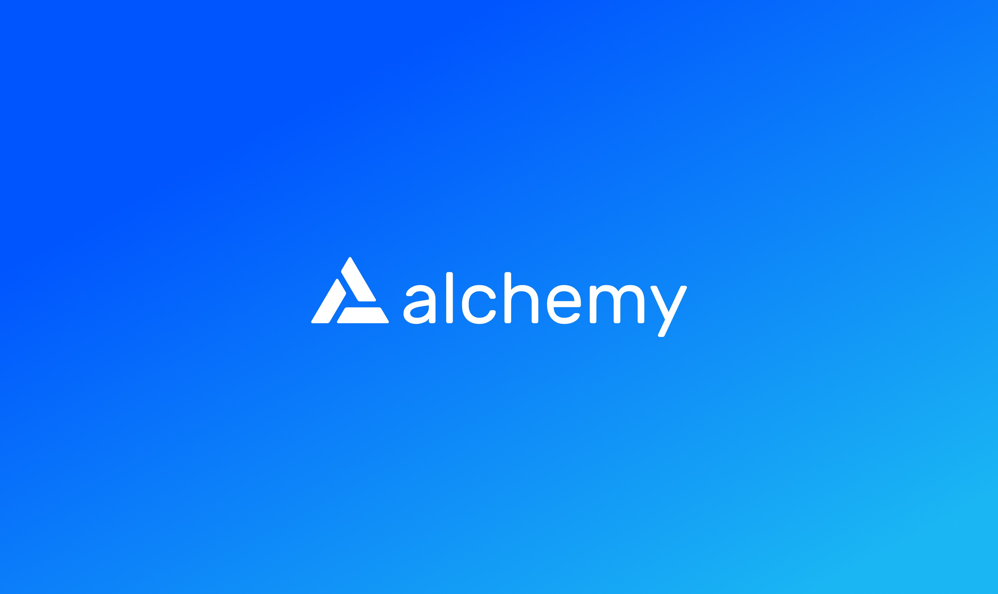 alchemy logo on a blue background