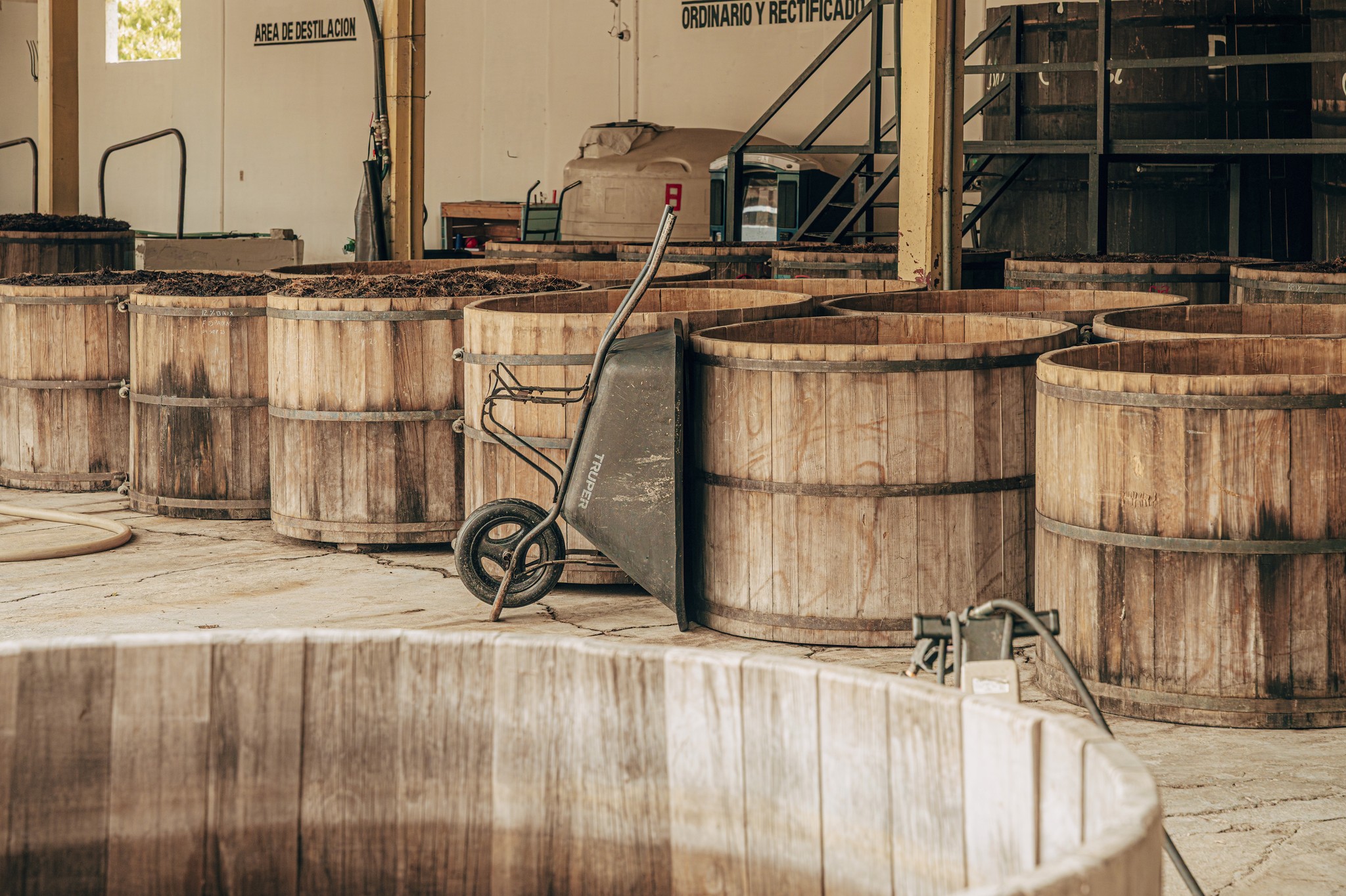a couple of bottles sitting on top of a wooden table