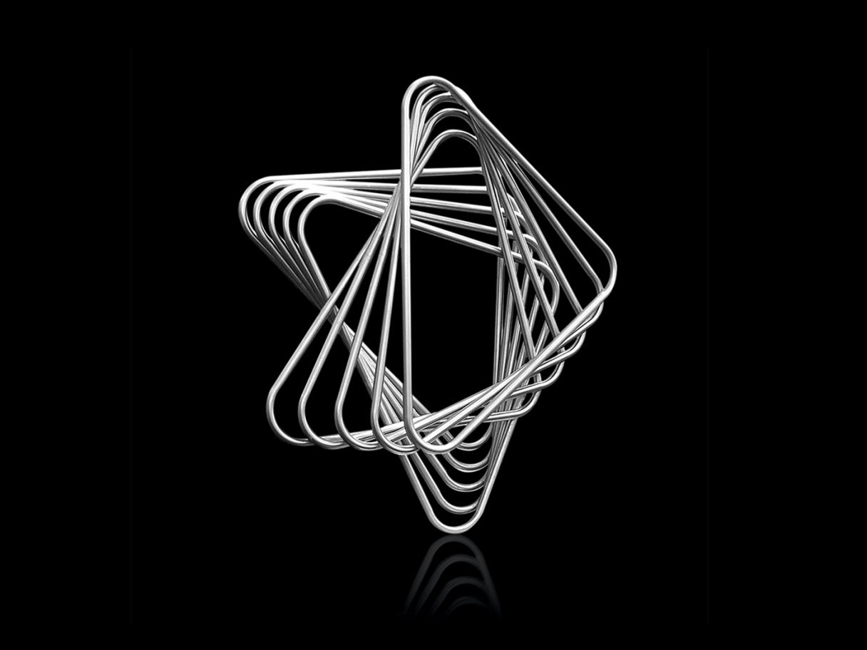 Rustic cabin in a golden field at sunset