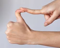 a person folding back their thumb with unnatural flexibility