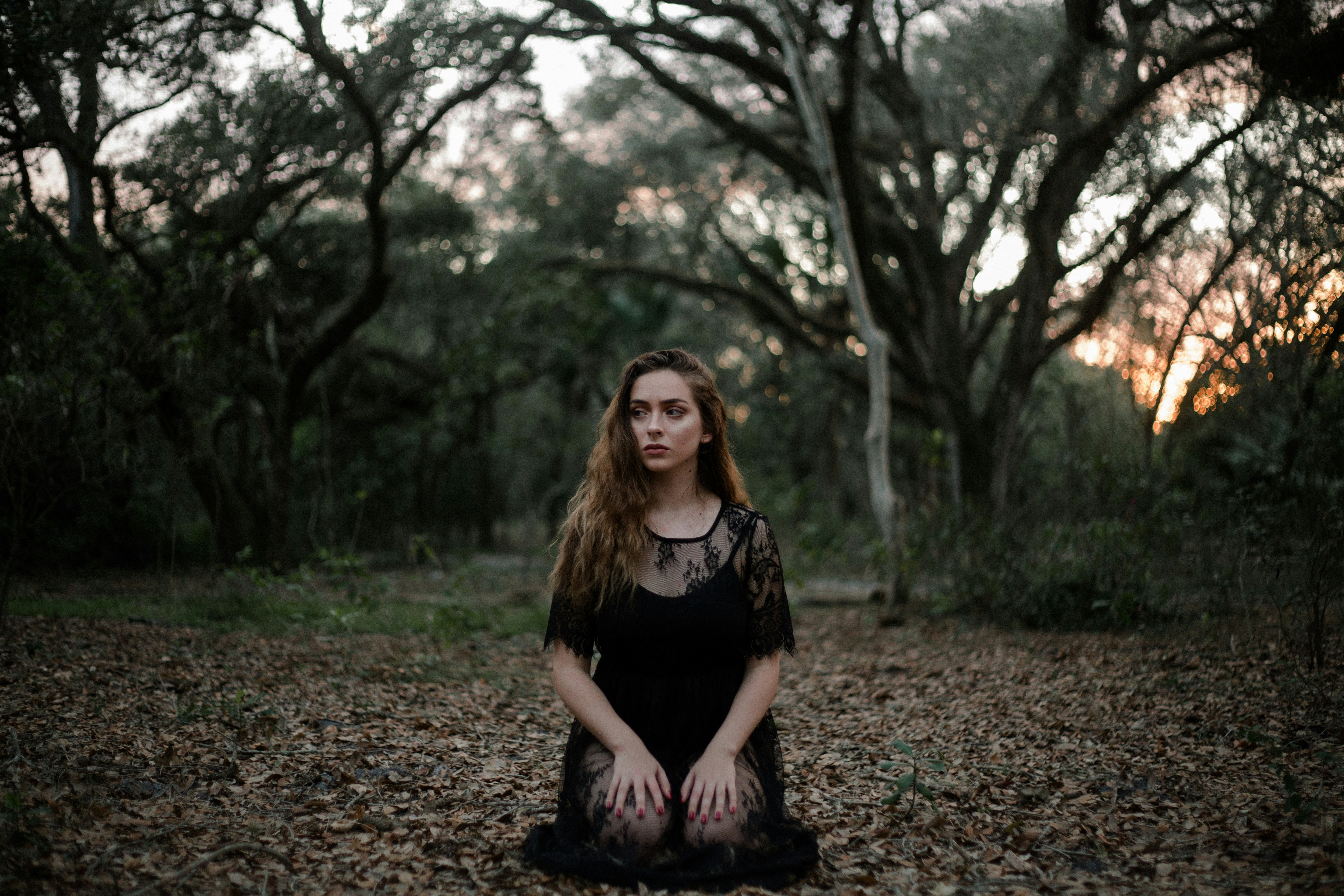 woman in a photoshoot in a forest - How to Know What Colors Look Good on You