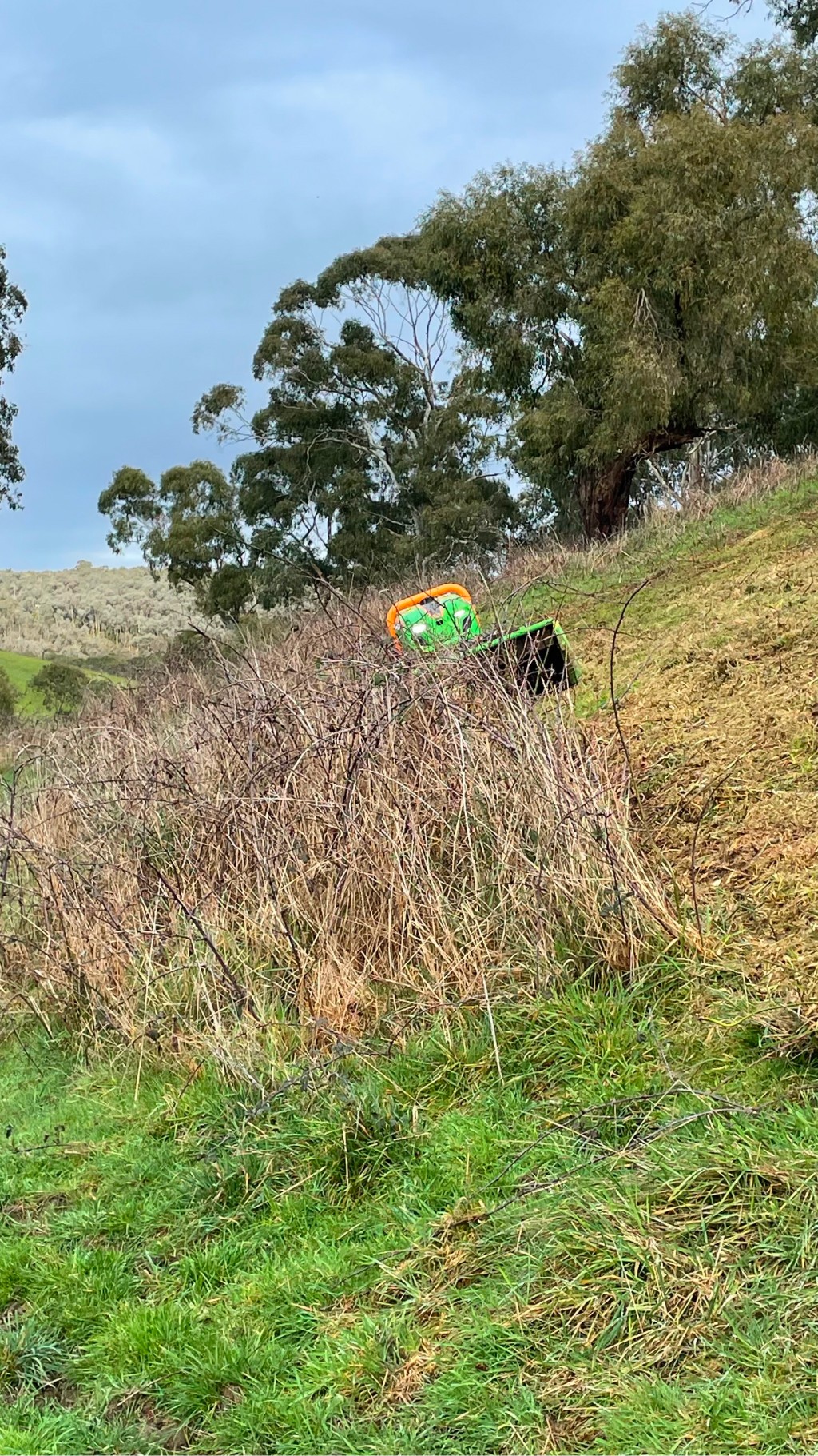 Handling slippery terrain to reclaim steep overgrown land