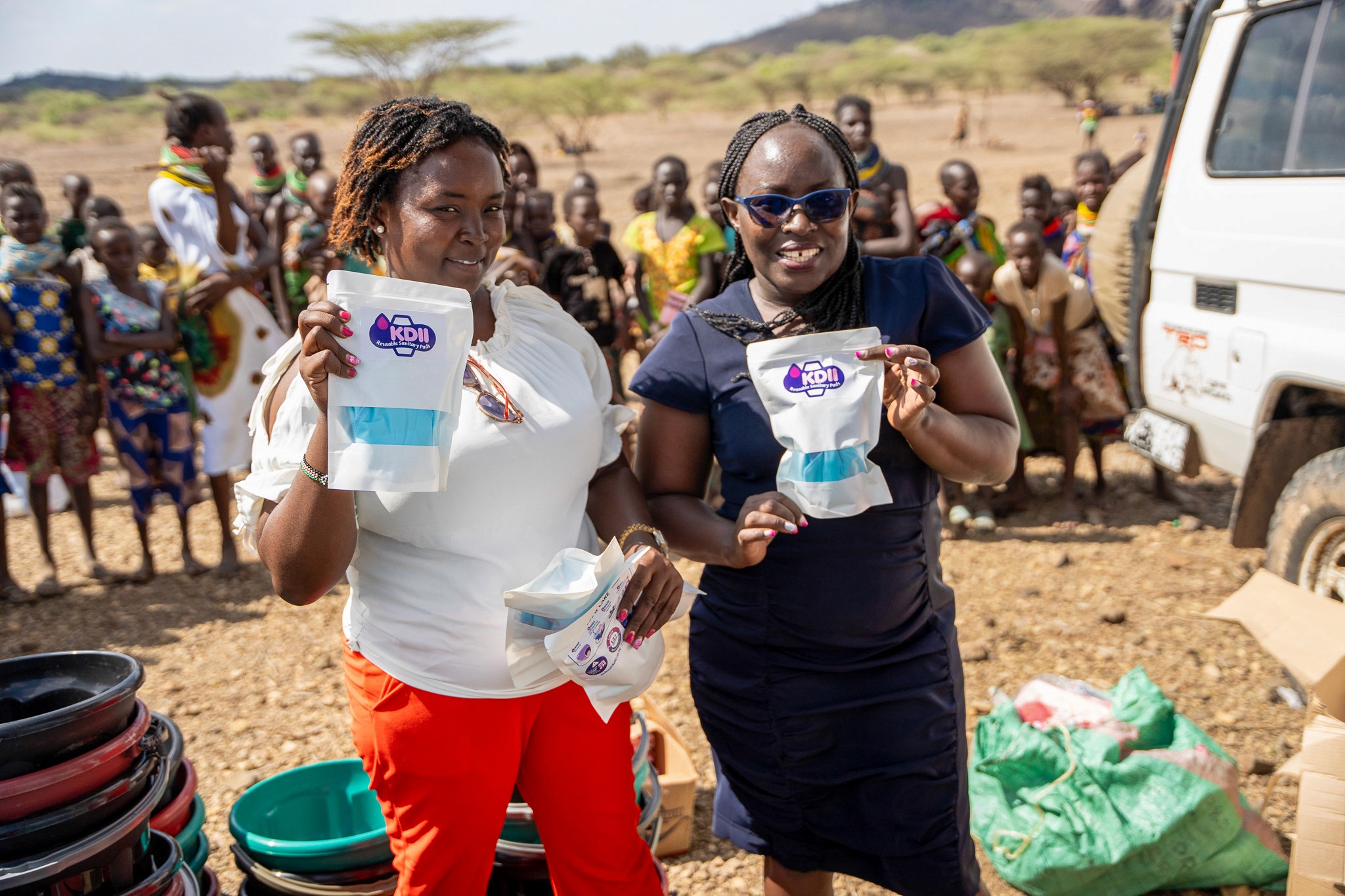 a black and white living room with a large tv