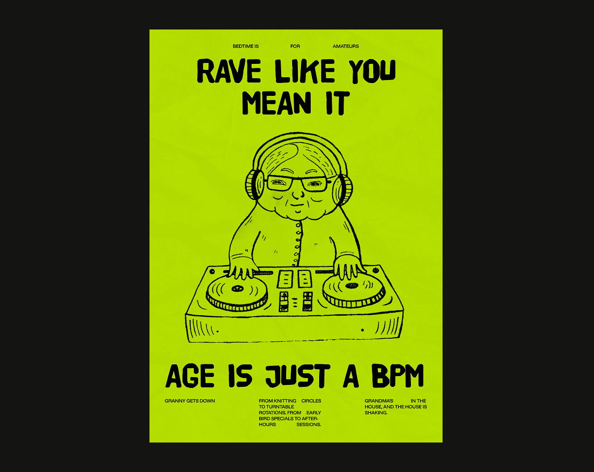 A close-up of a hand wearing multiple decorative rings against a blue background.