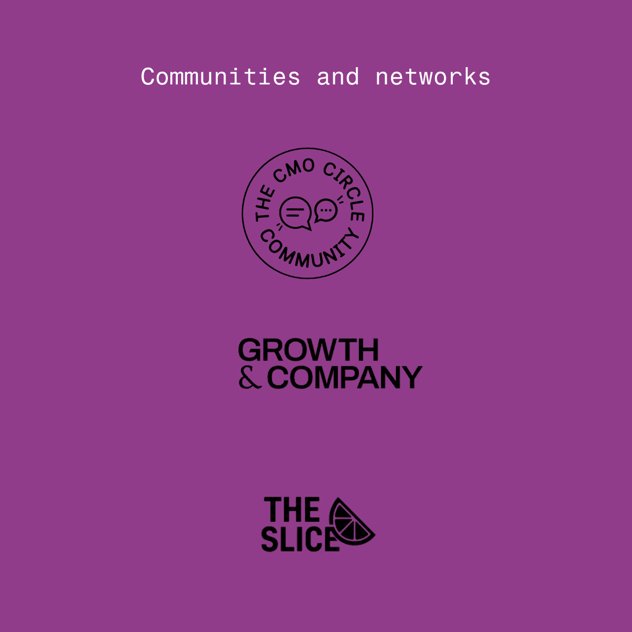 Woman with curly dark hair and glasses, wearing a floral burgundy blouse, facing camera