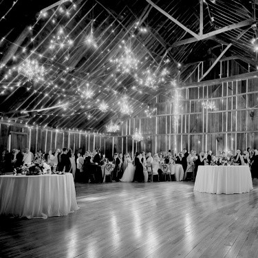 A rustic barn wedding in Collingwood, Ontario, with charming decor and a lively atmosphere, as NightStyle DJs set the perfect mood for the celebration.