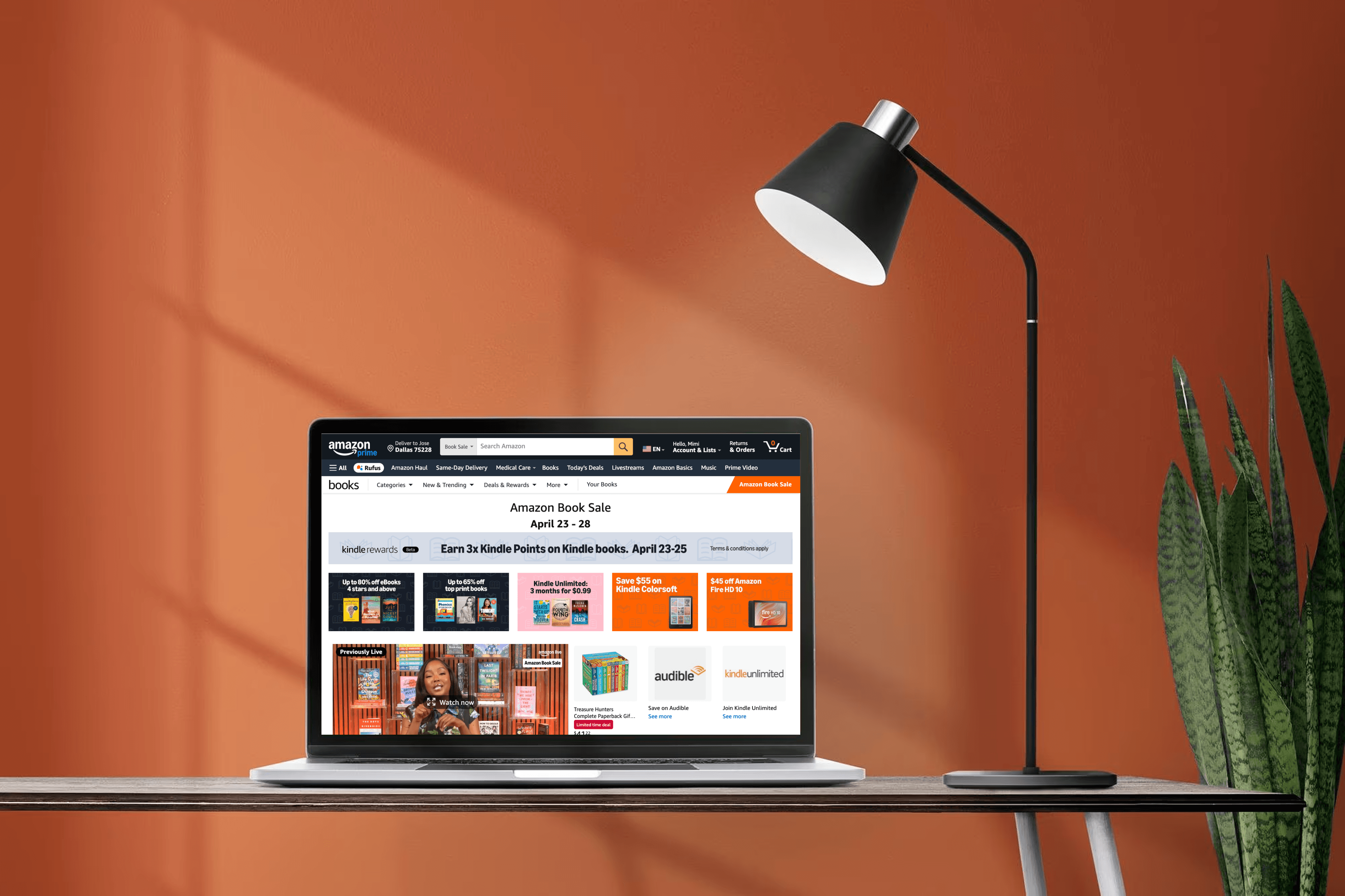 A mockup for a Macbook place on a table for book shopping website