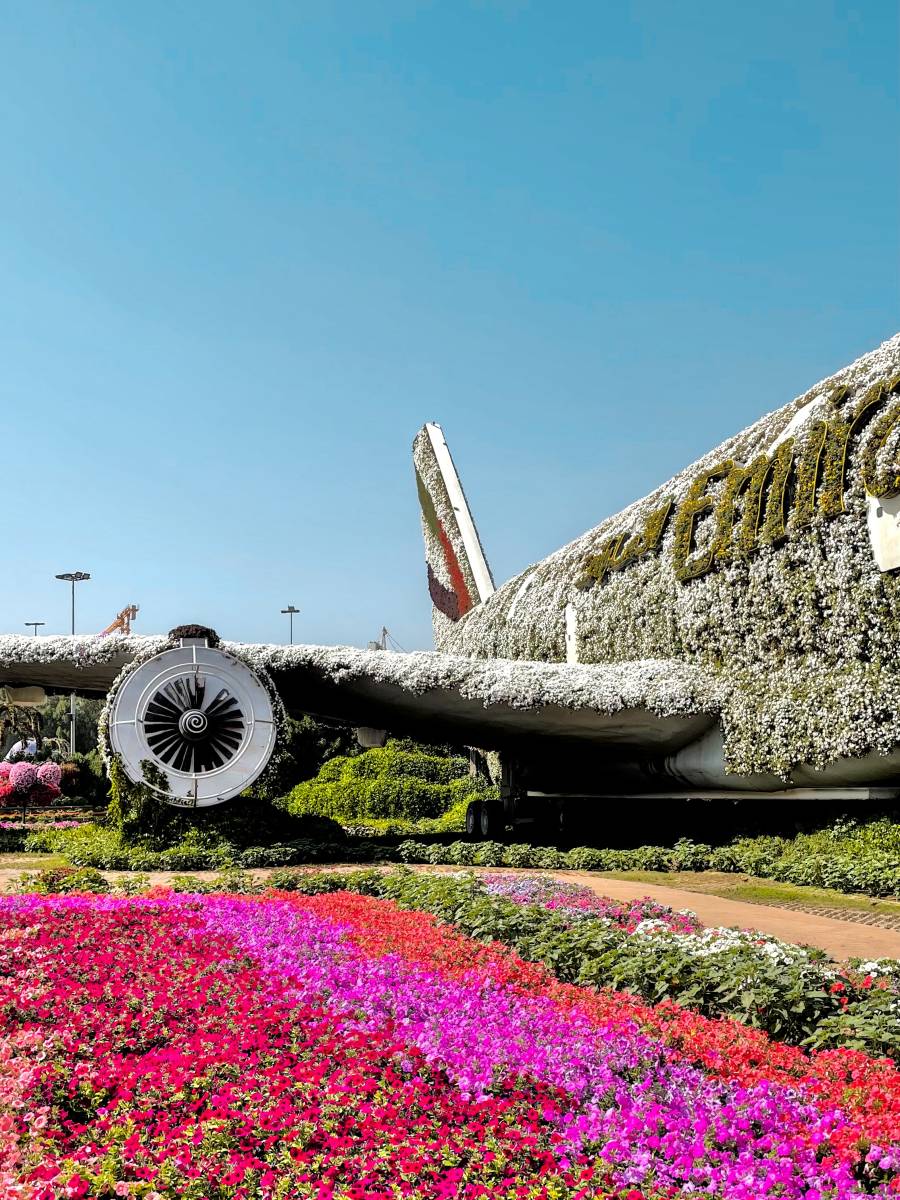 three brown wooden boat on blue lake water taken at daytime
