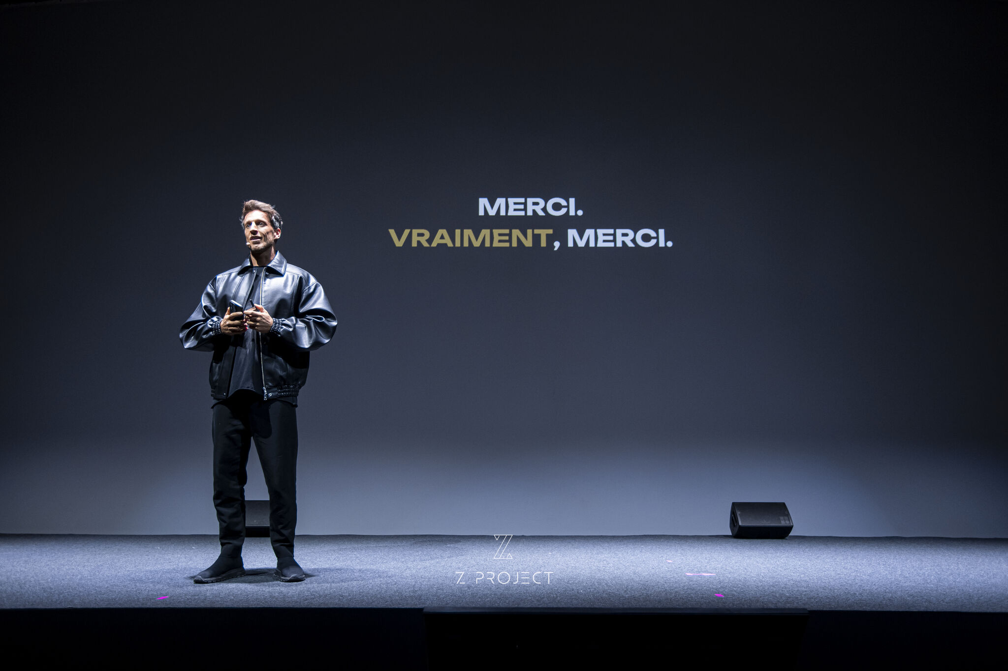 Minimal beige home office with wooden desk, plants.