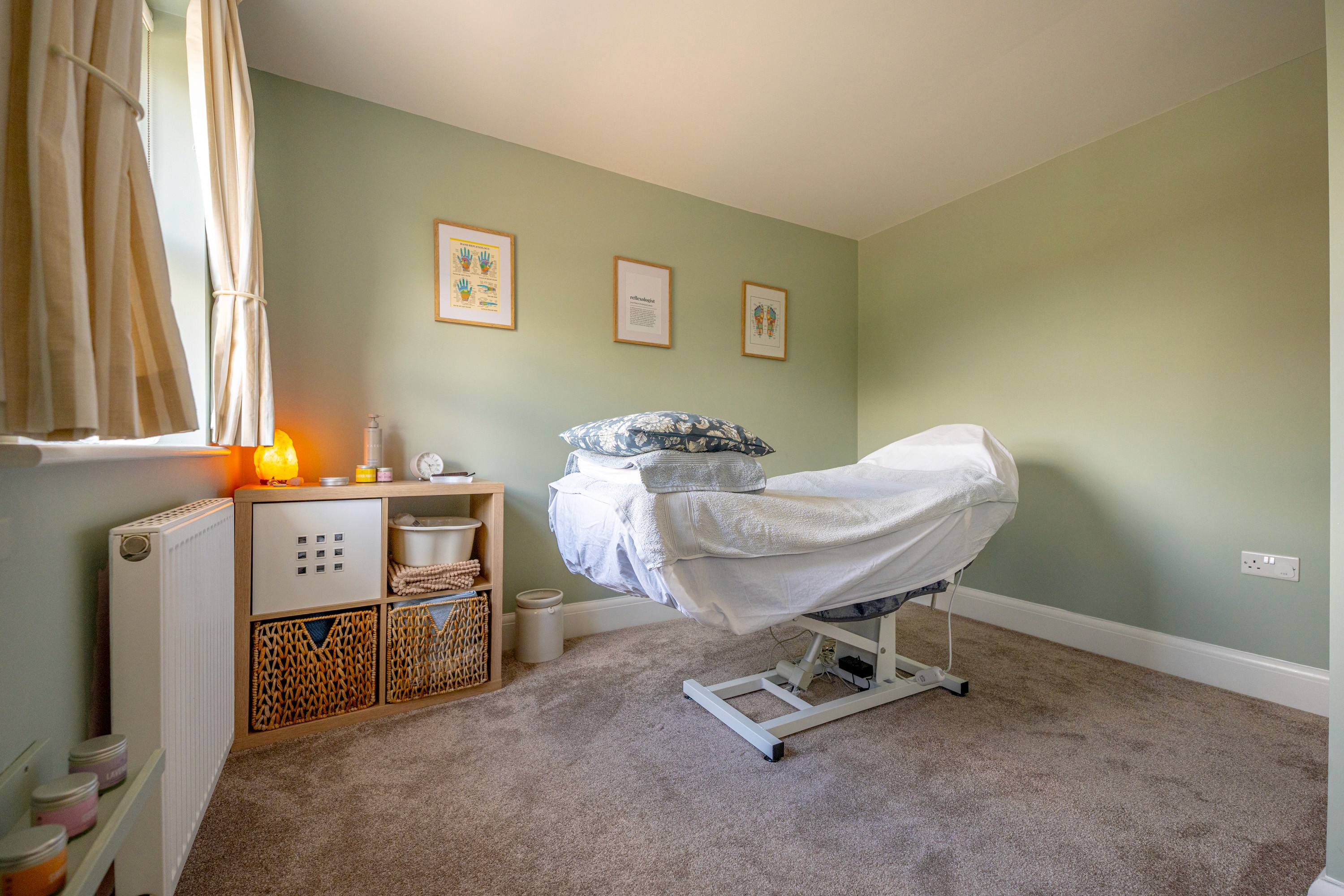 Yoga studio with mats, bolsters and plants