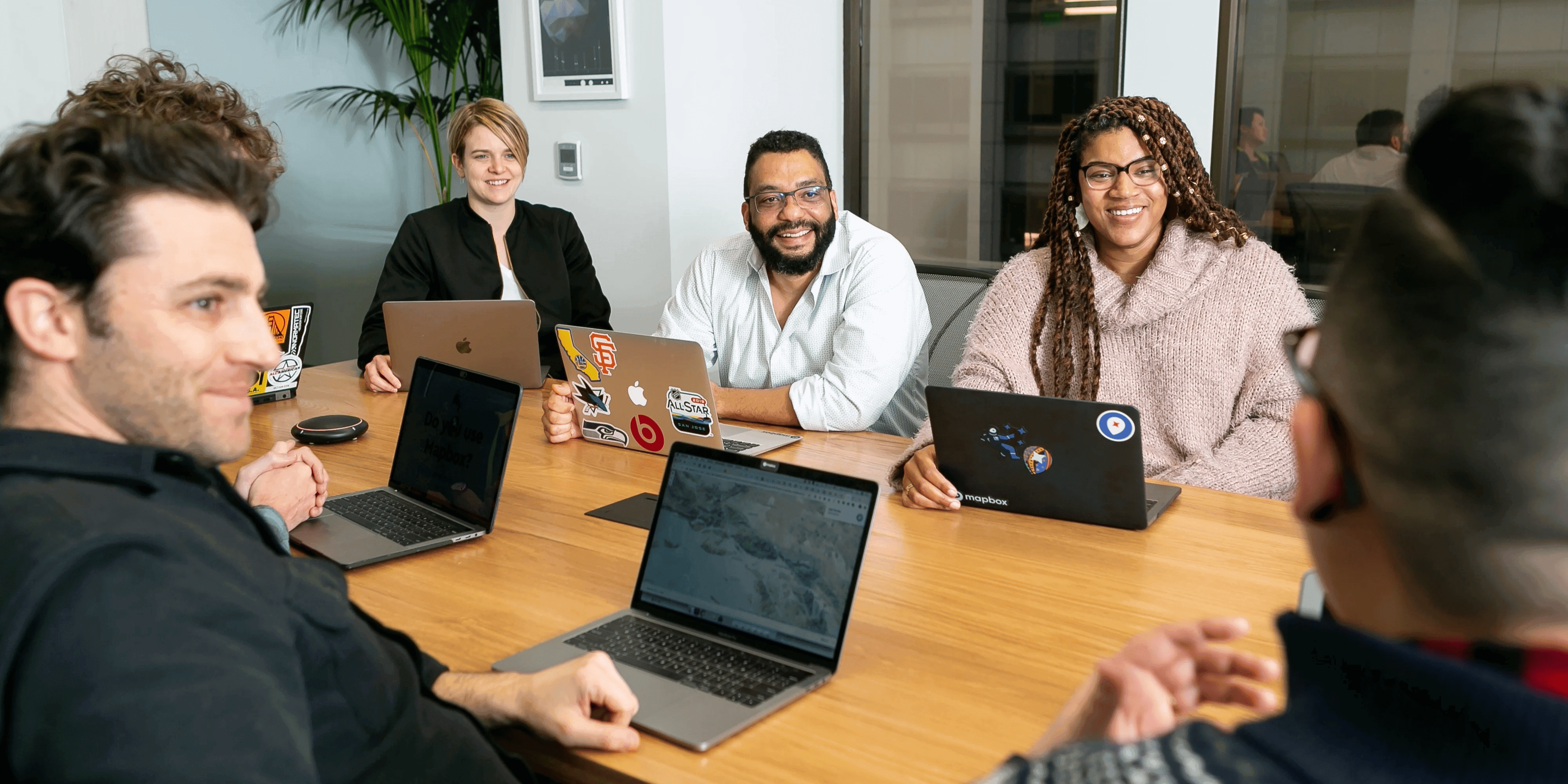 Group business meeting in modern office room for recruiters highlighting hiring culture