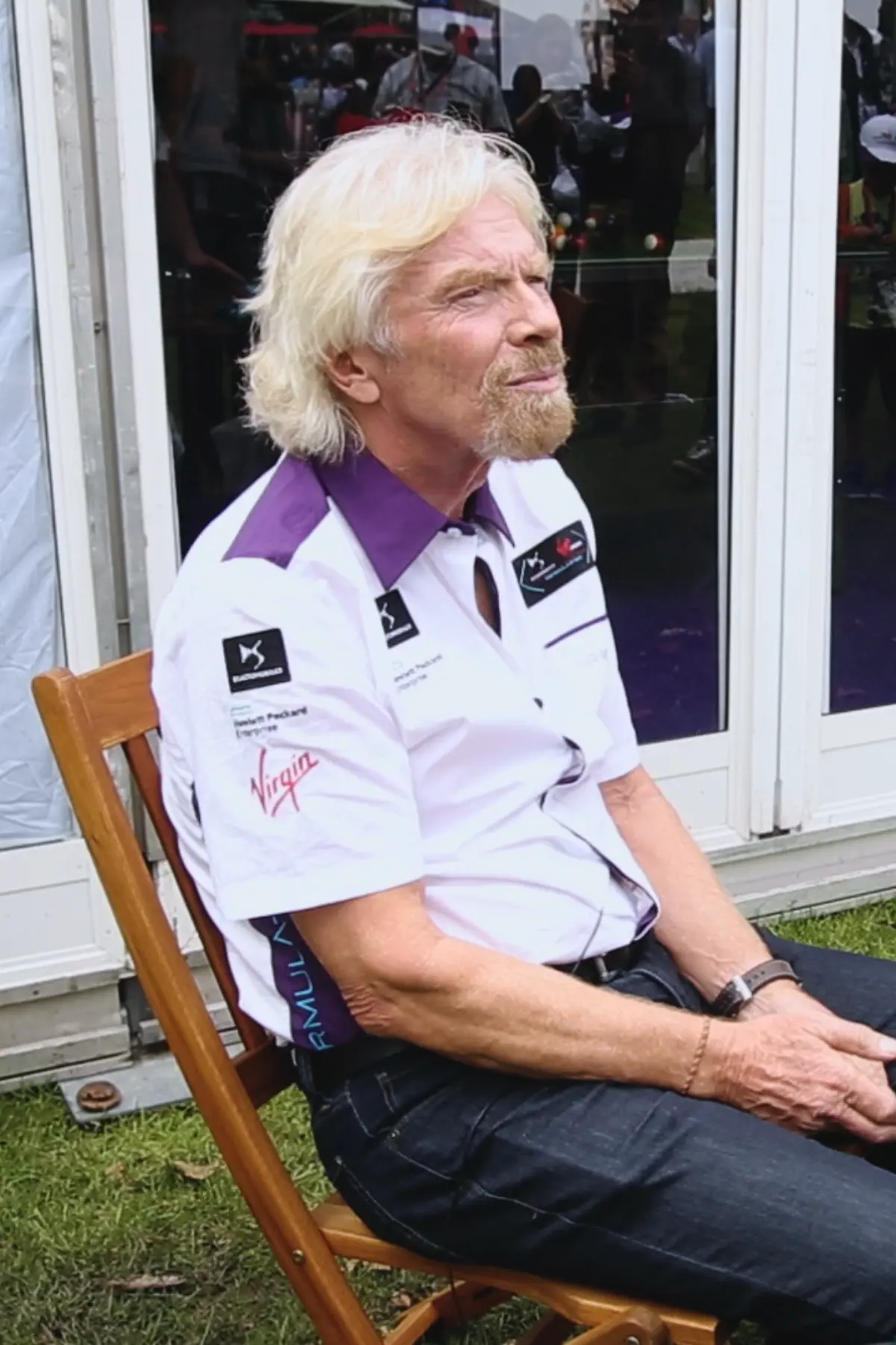 Richard Branson seated during an interview conversation with Agent Blonde