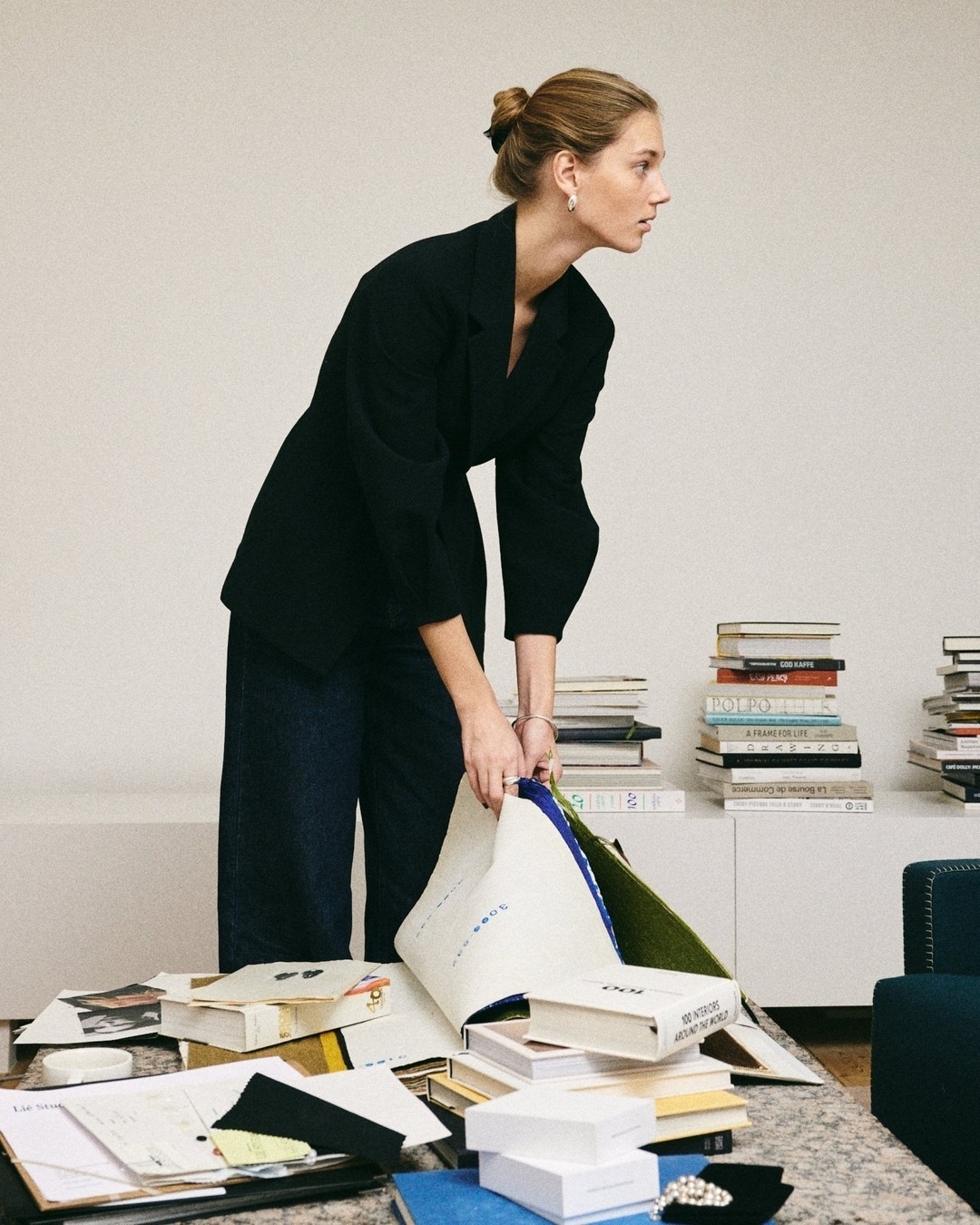 Portrait of Eva Lagm, Studio Leadership, photographed in a bright open workspace