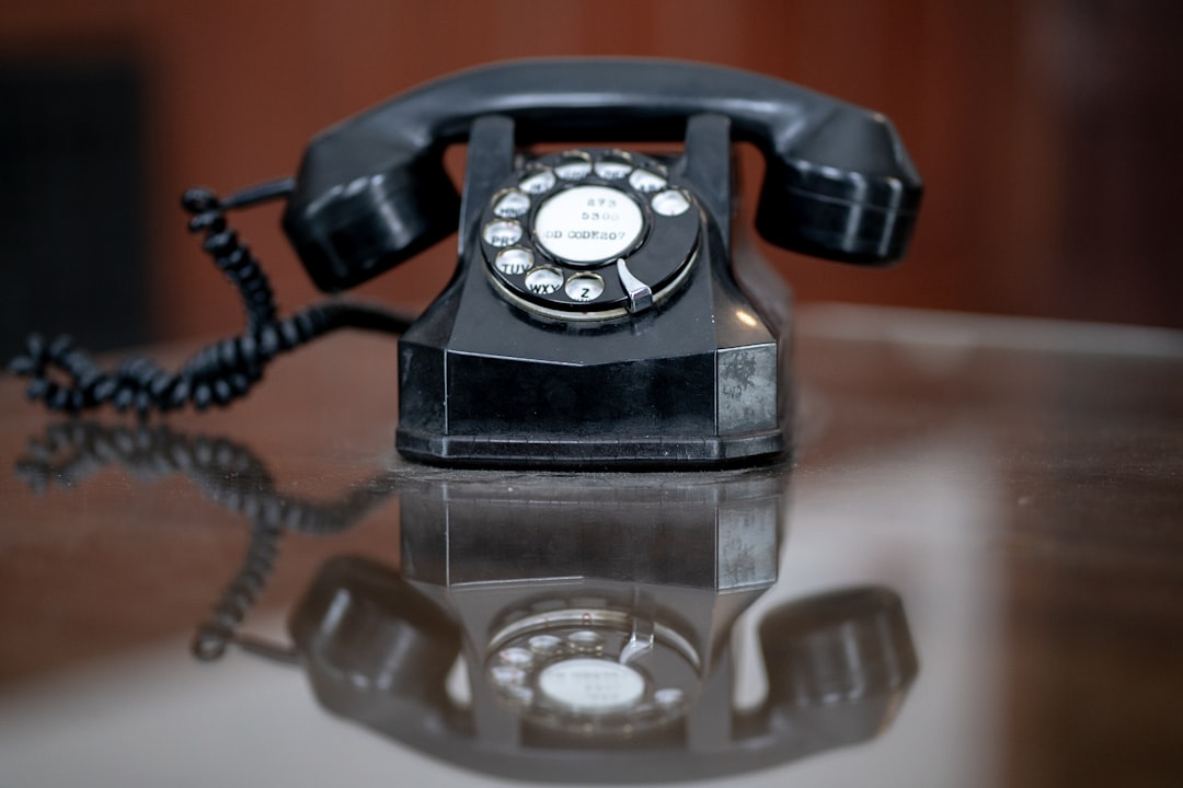A phone ringing repeatedly from a persistent debt collector