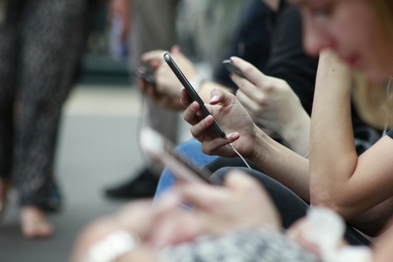 People with mobile in their hands