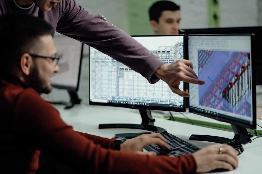 civil engineers reviewing digital models on site
